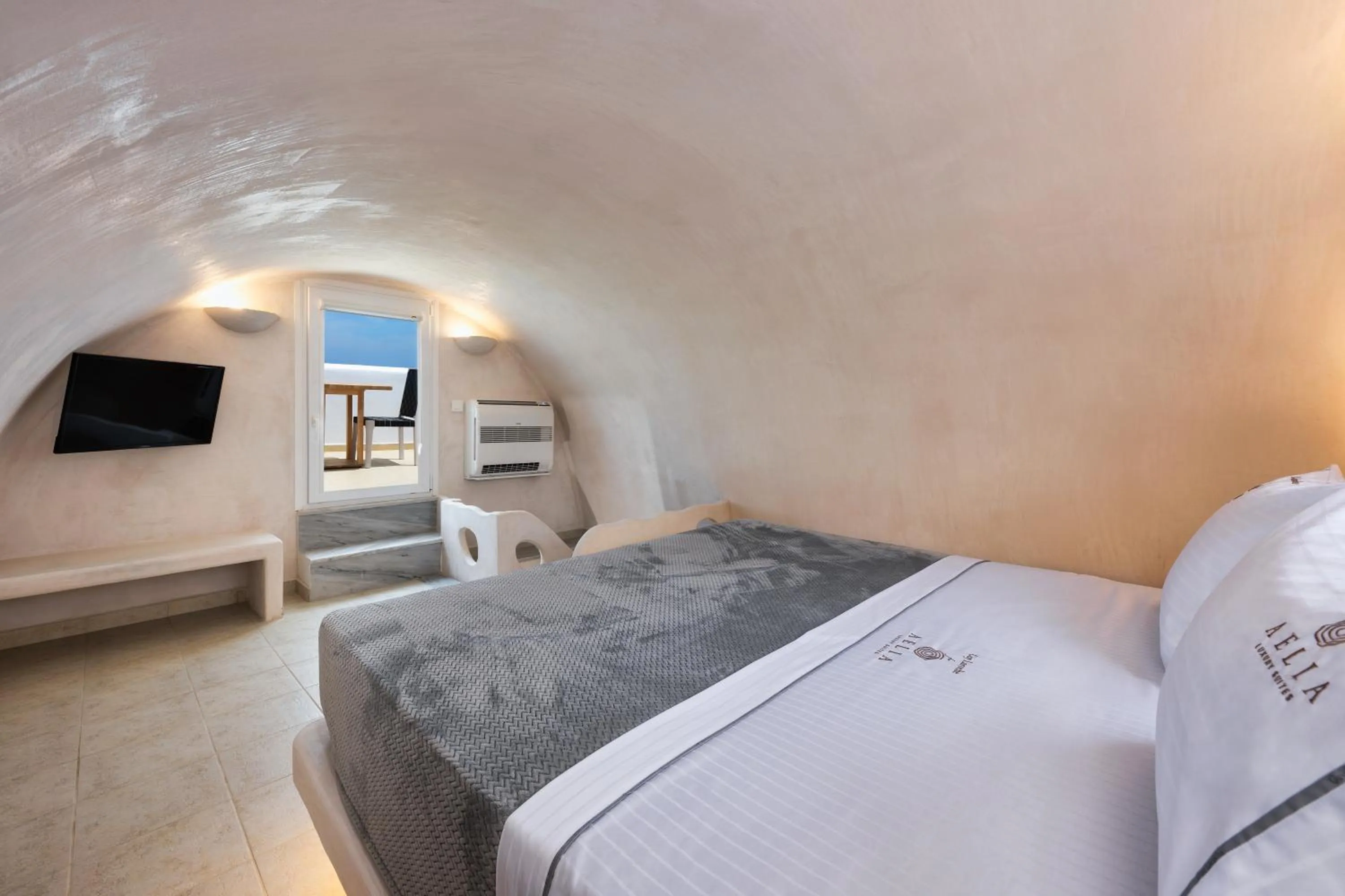 Bed in Aelia Luxury Suites