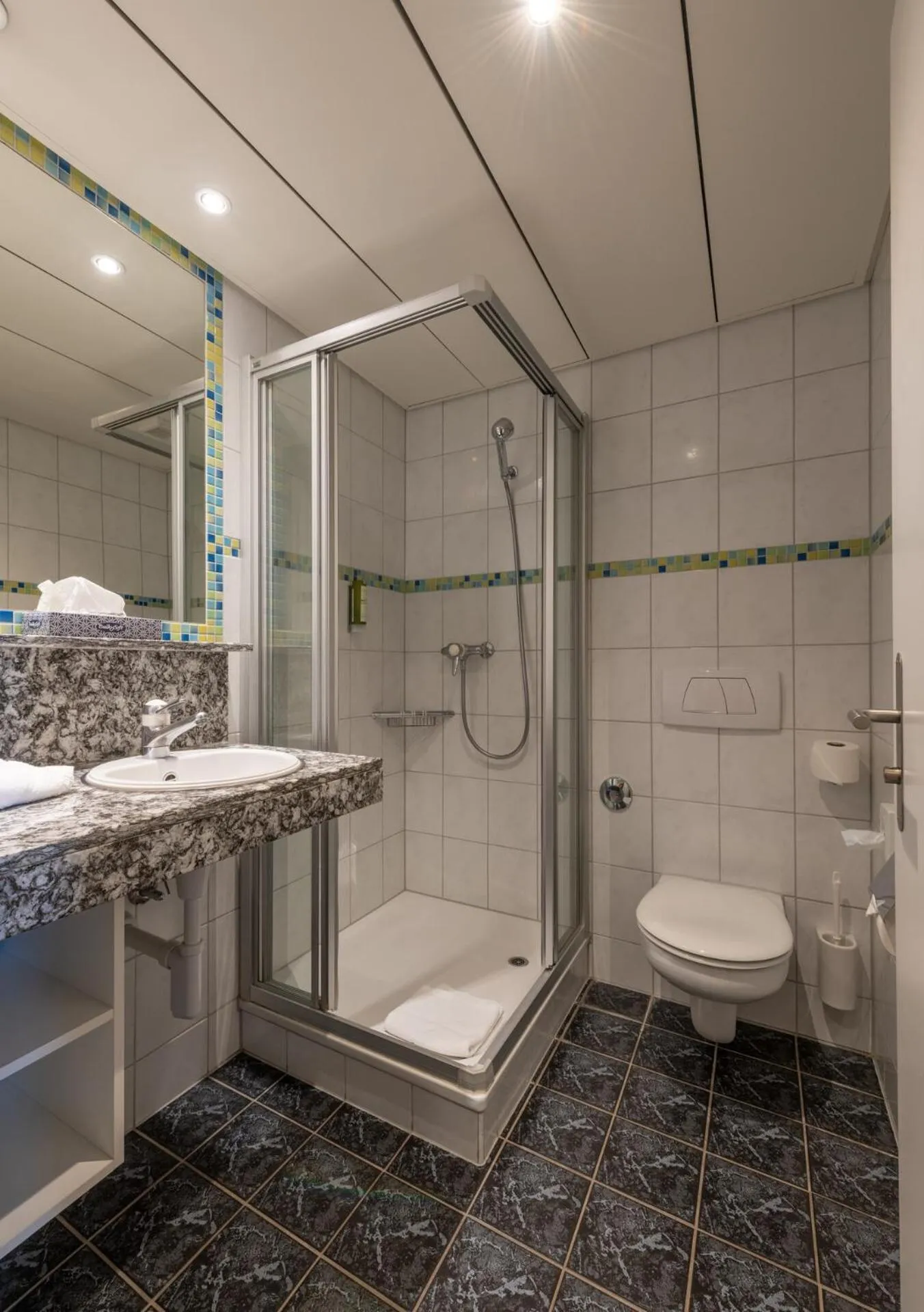 Shower in Hotel Victoria Lauberhorn Wengen, a Faern Collection Hotel