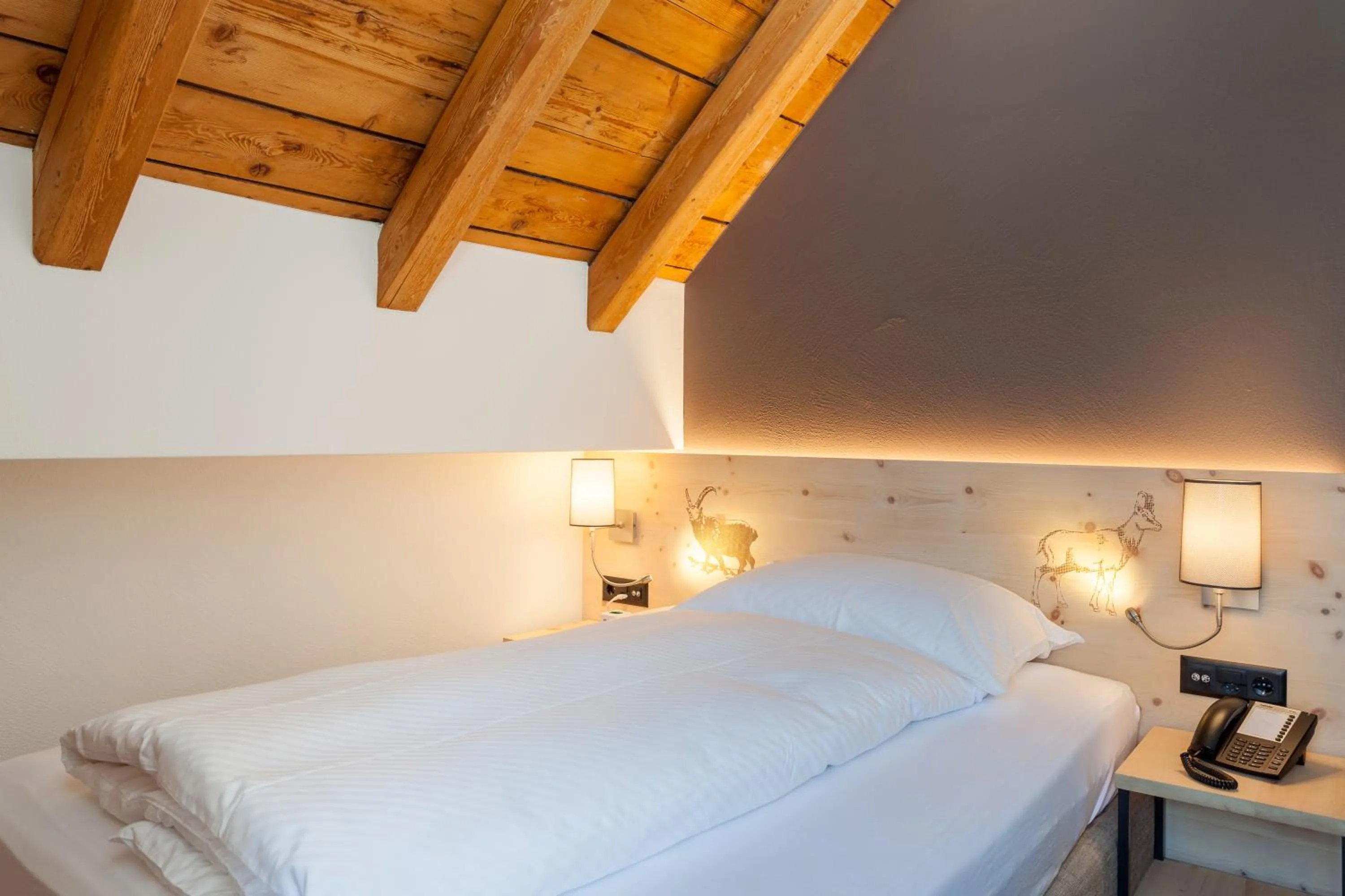 Decorative detail, Bed in Hotel Waldhaus am See