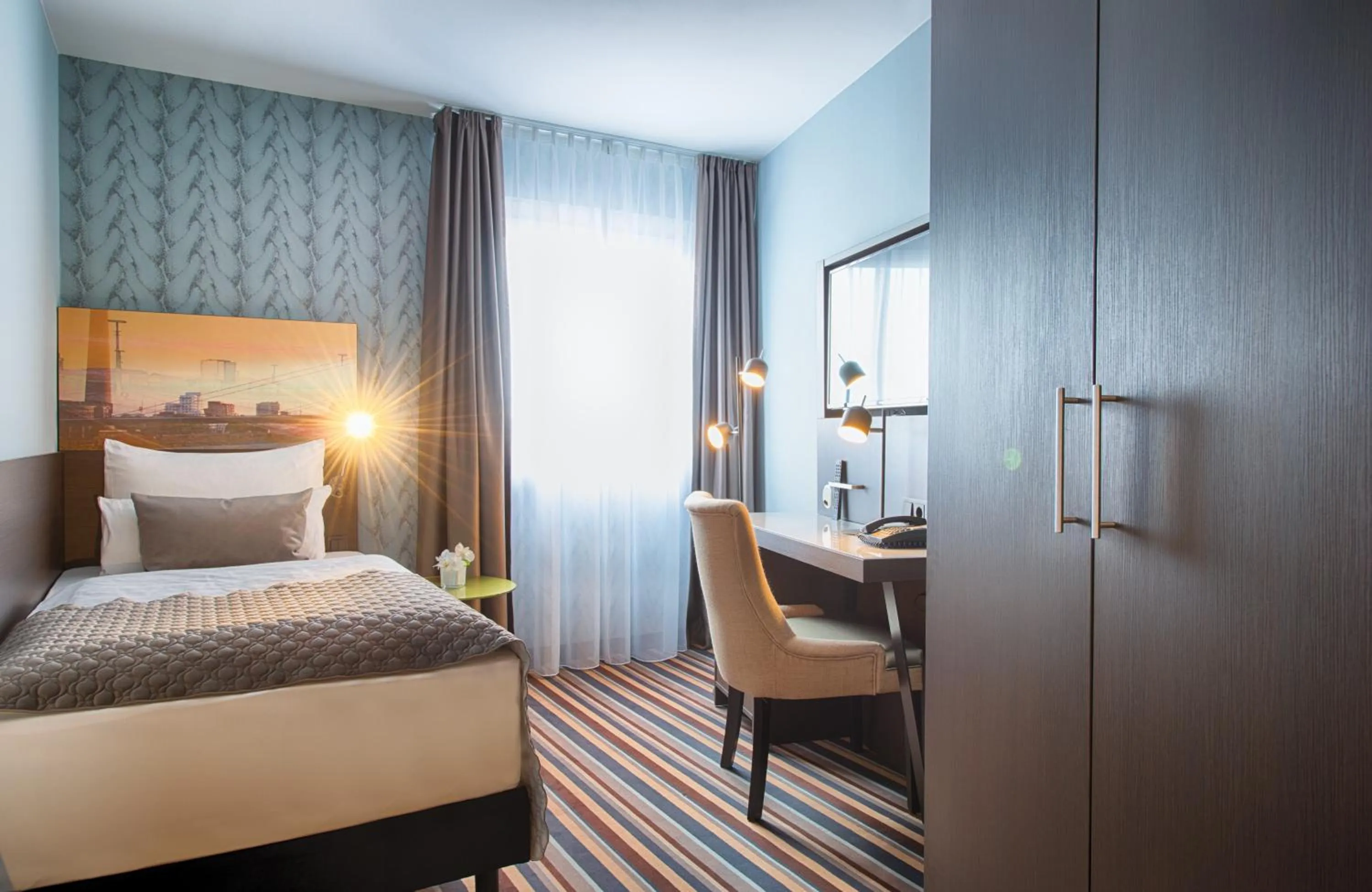 Photo of the whole room, Bed in Leonardo Boutique Hotel Düsseldorf