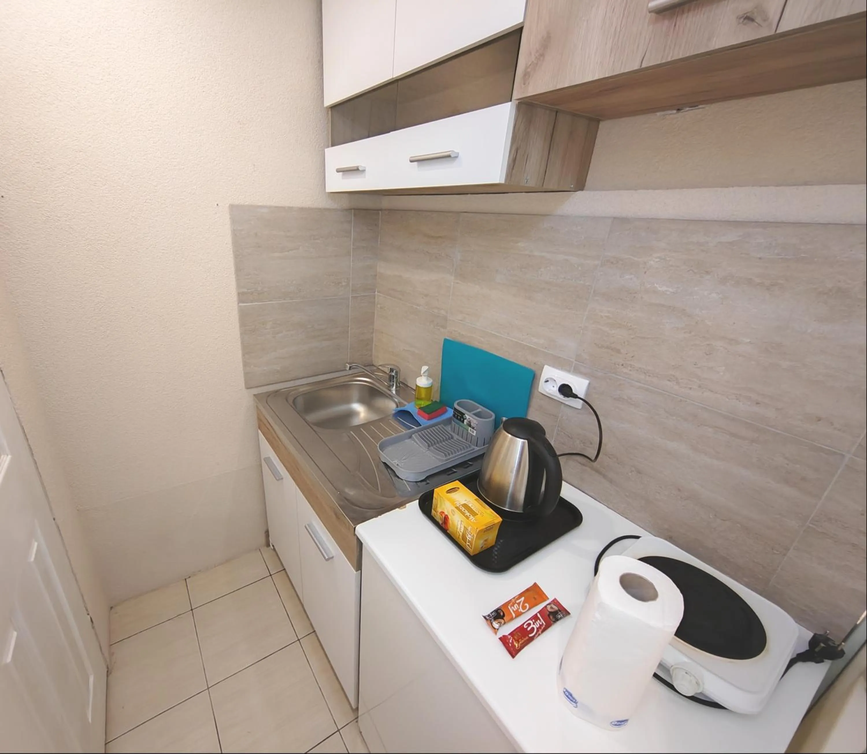 Kitchen or kitchenette in MAGENTA Apartments
