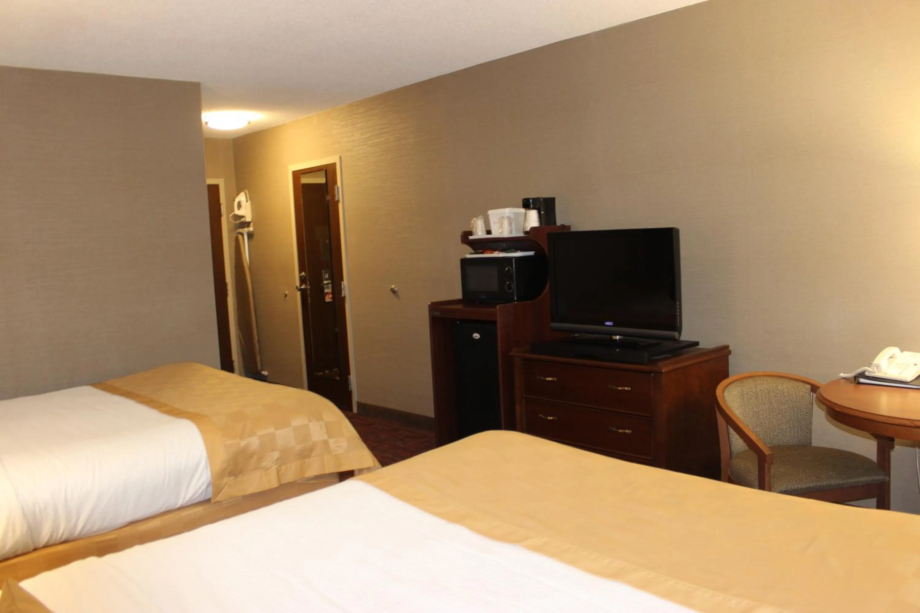 Bed in Ramada by Wyndham Grand Forks