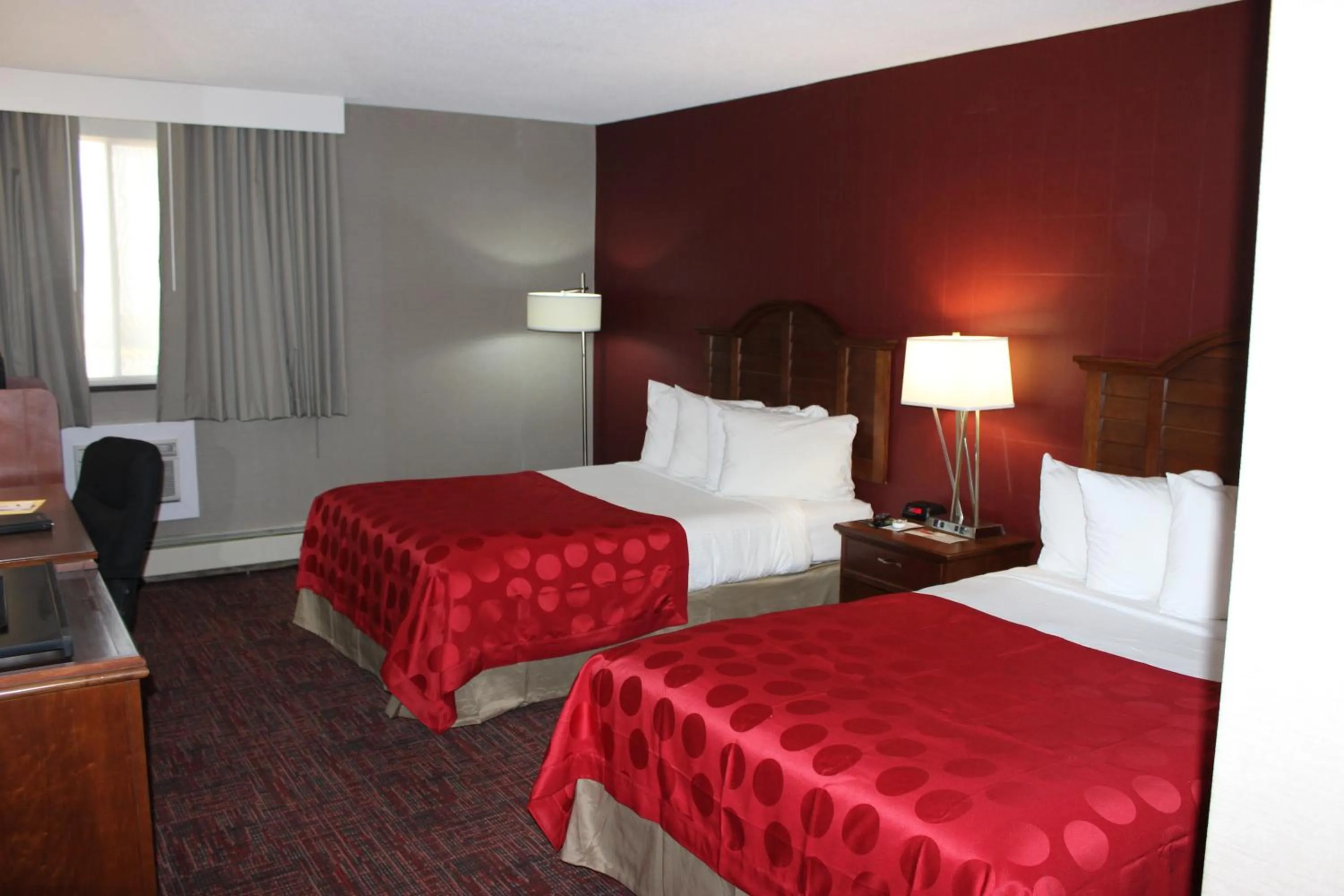 Bed in Ramada by Wyndham Grand Forks