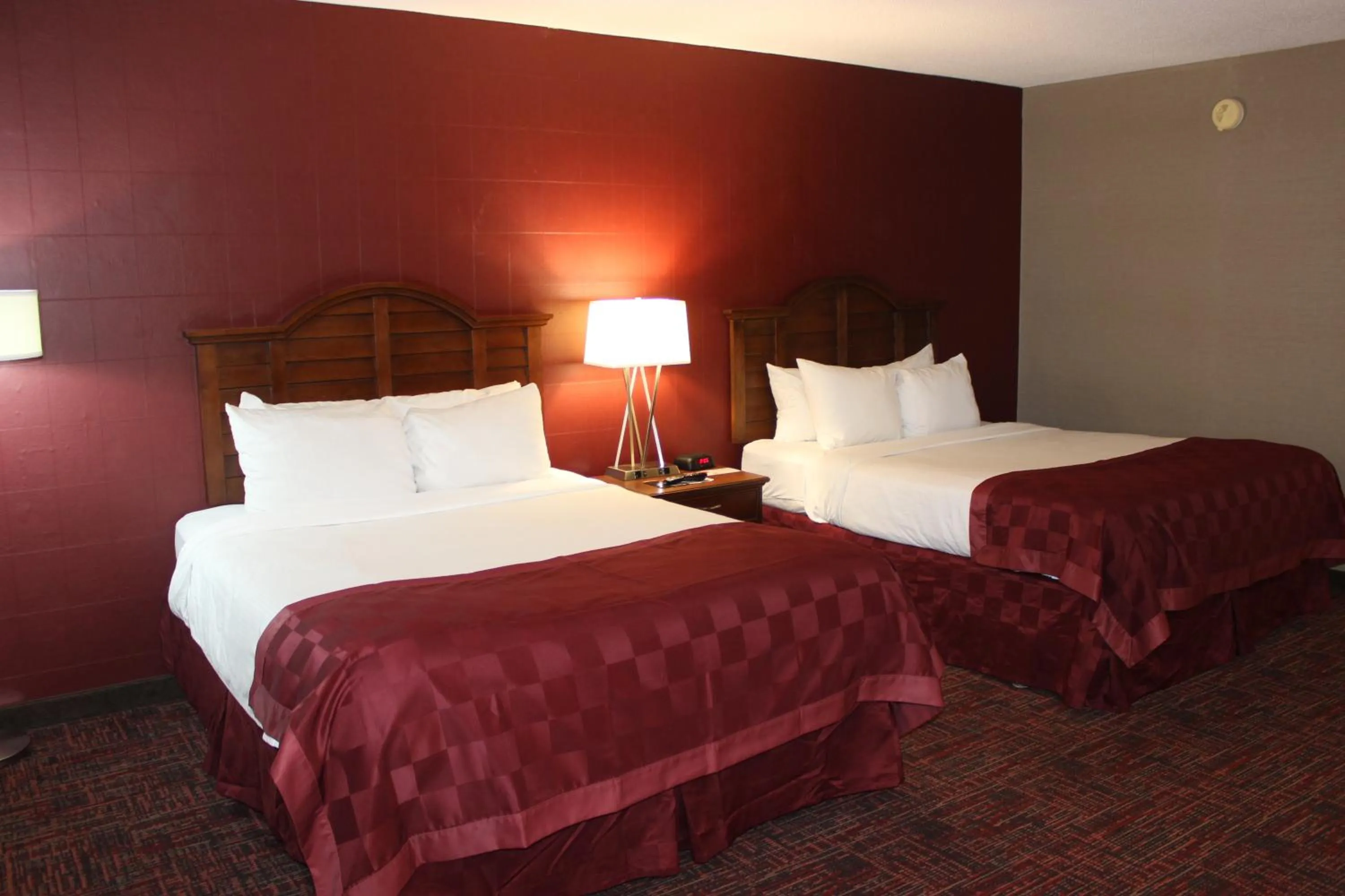 Bed in Ramada by Wyndham Grand Forks