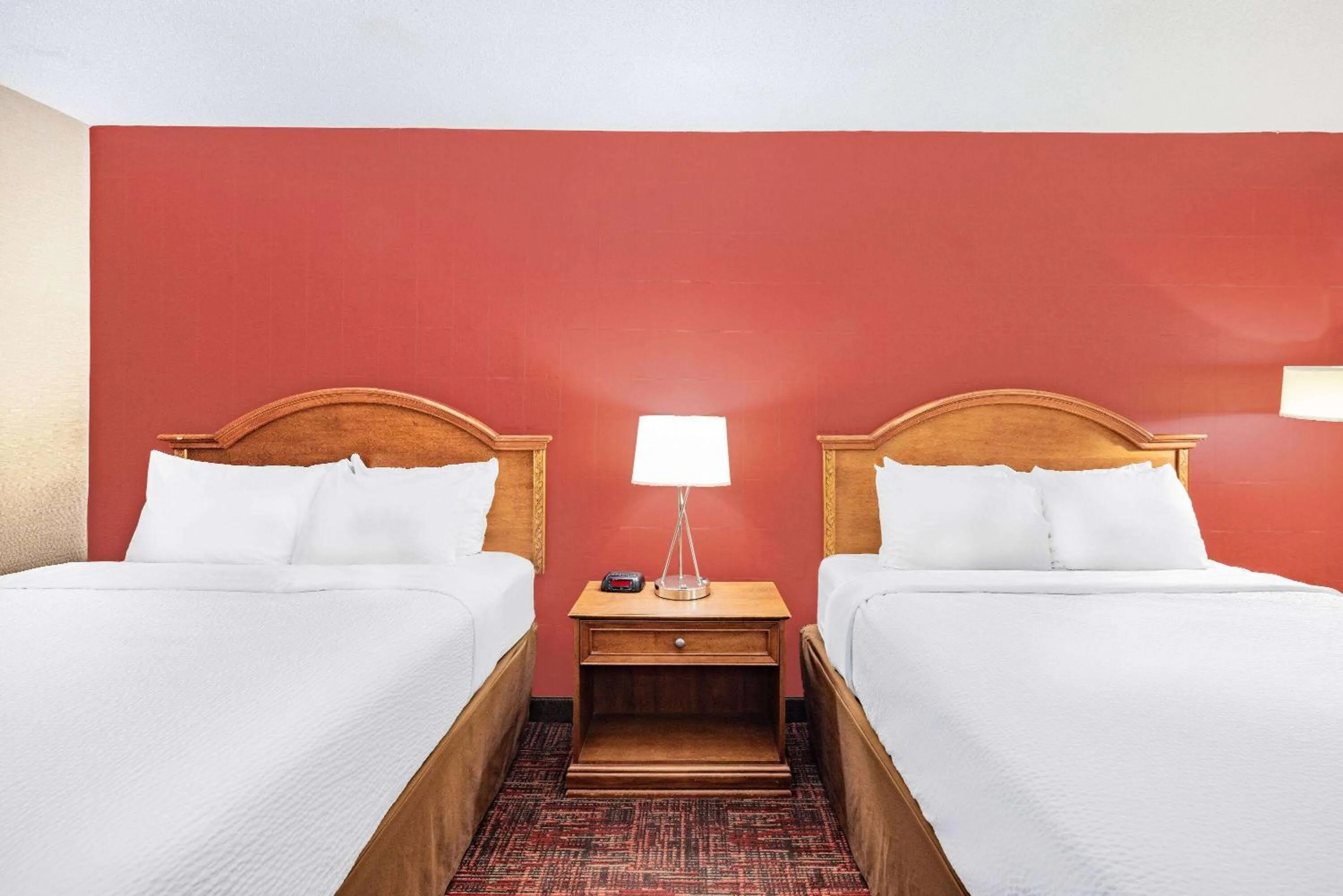 Bed in Ramada by Wyndham Grand Forks