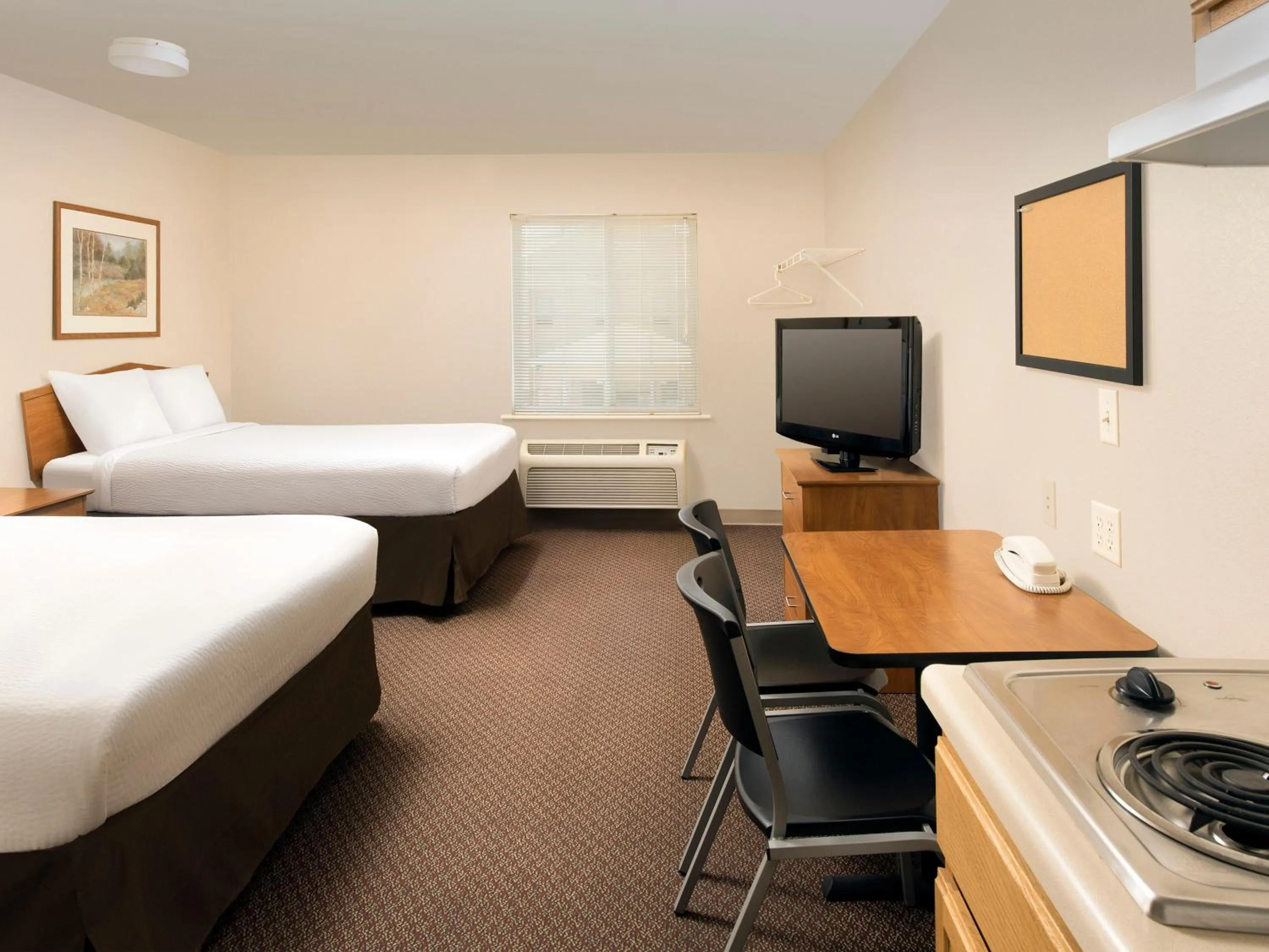 TV and multimedia, Bed in WoodSpring Suites Junction City