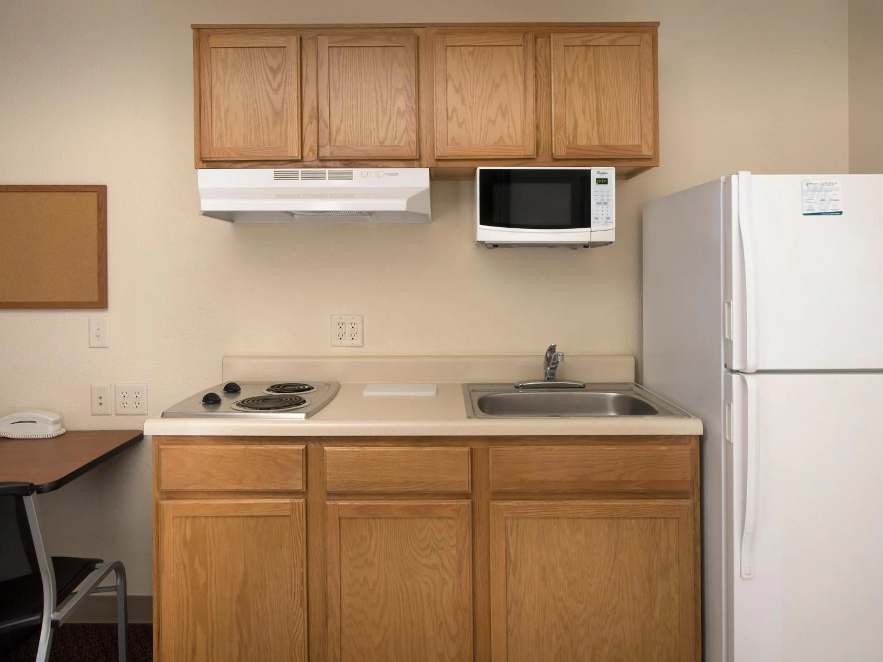 Kitchen or kitchenette in WoodSpring Suites Junction City