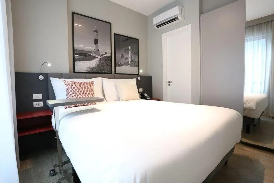 Bed in Astron Suítes Mondial Salvador by Nobile