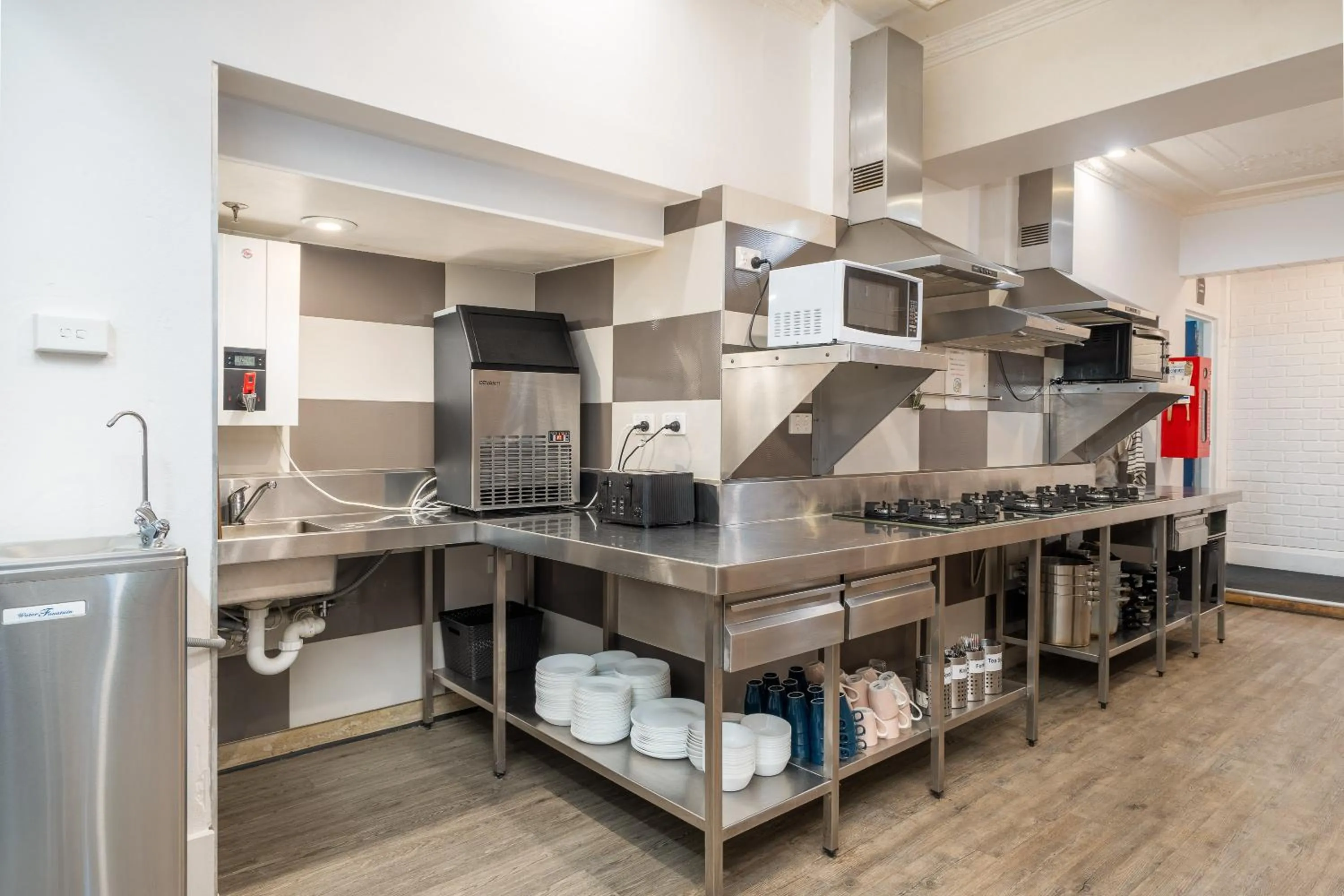 Communal kitchen in Tequila Sunrise Potts Point