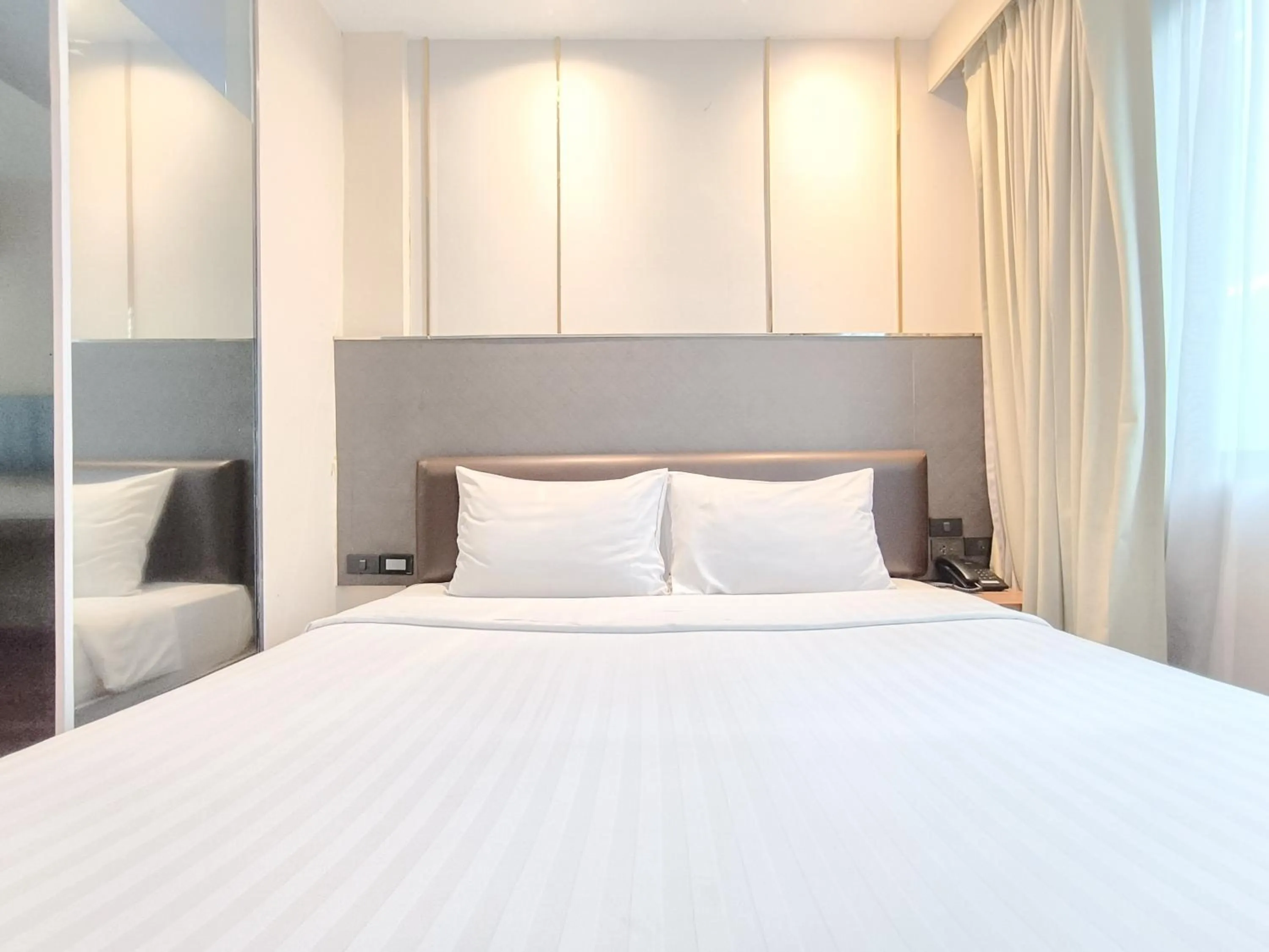 Bed in Citin Sukhumvit 11 Nana Bangkok by Compass Hospitality