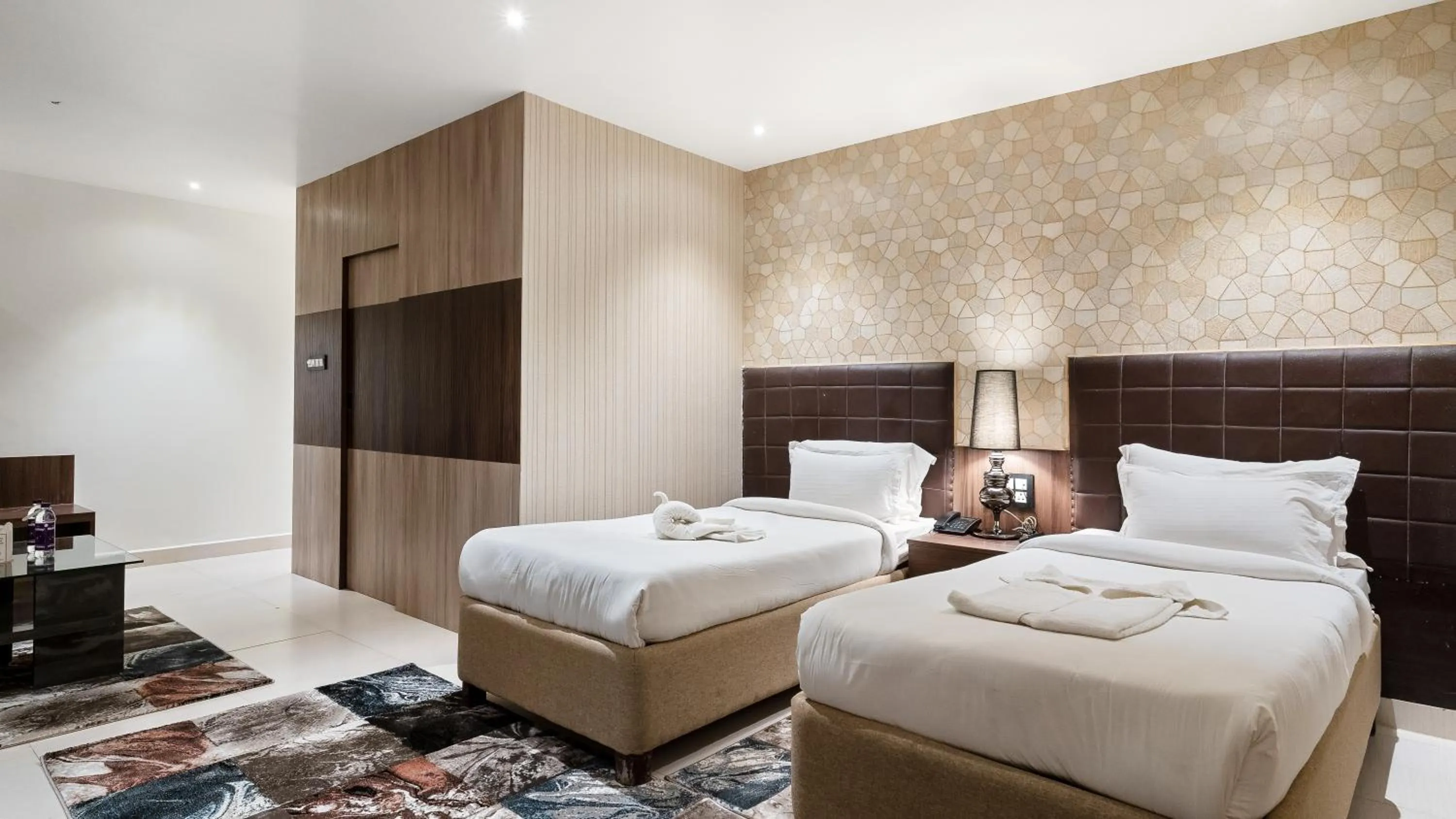 Bed in Niranjana Hotel Bodhgaya