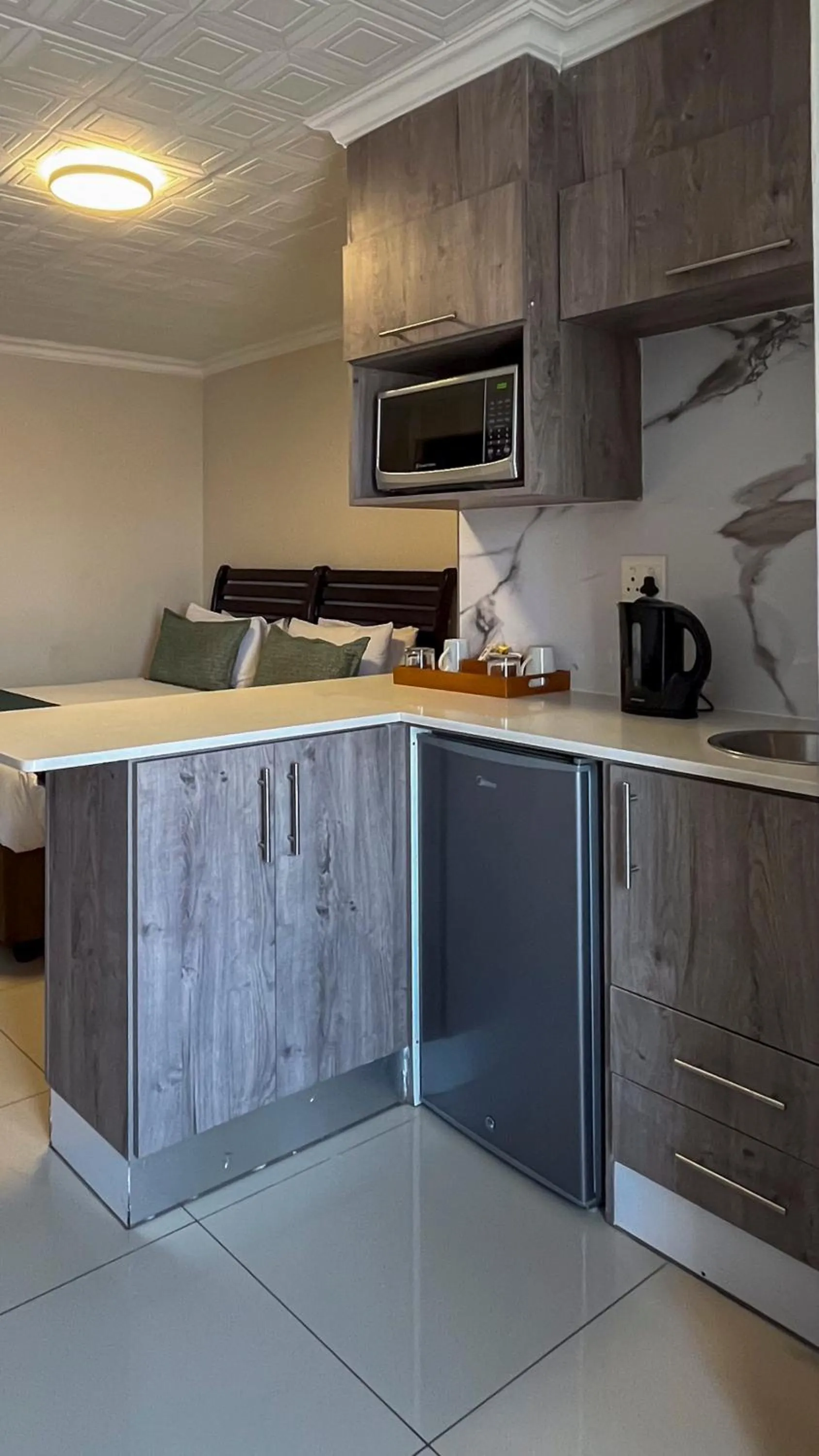 Kitchen or kitchenette in Regal Inn PMBurg