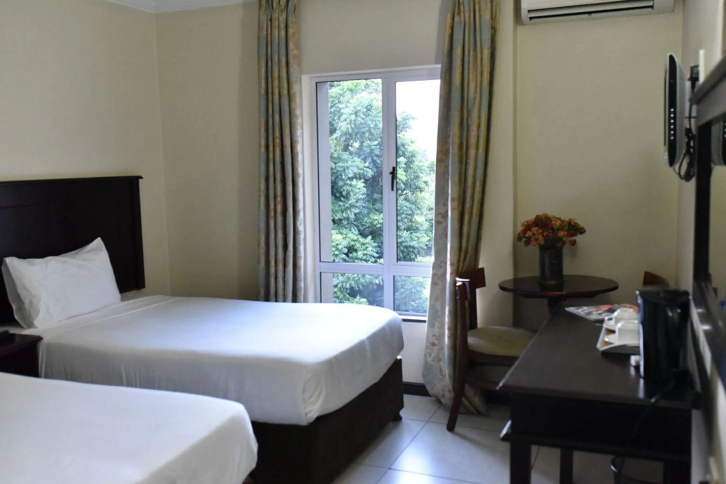 Bedroom, Bed in Regal Inn PMBurg