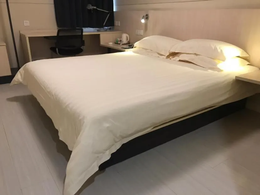 Bed in Jinjiang Inn Xuzhou Xinyi Municipal Government