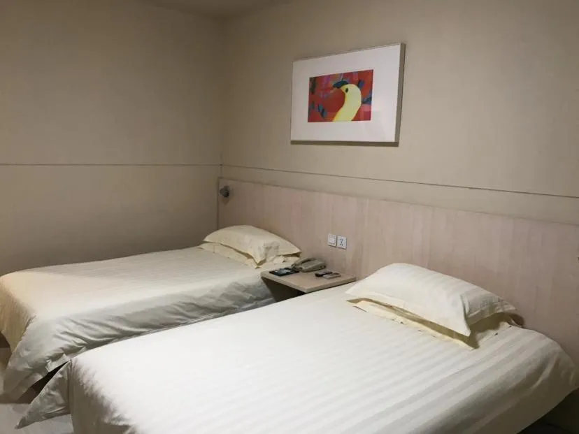 Bed in Jinjiang Inn Xuzhou Xinyi Municipal Government