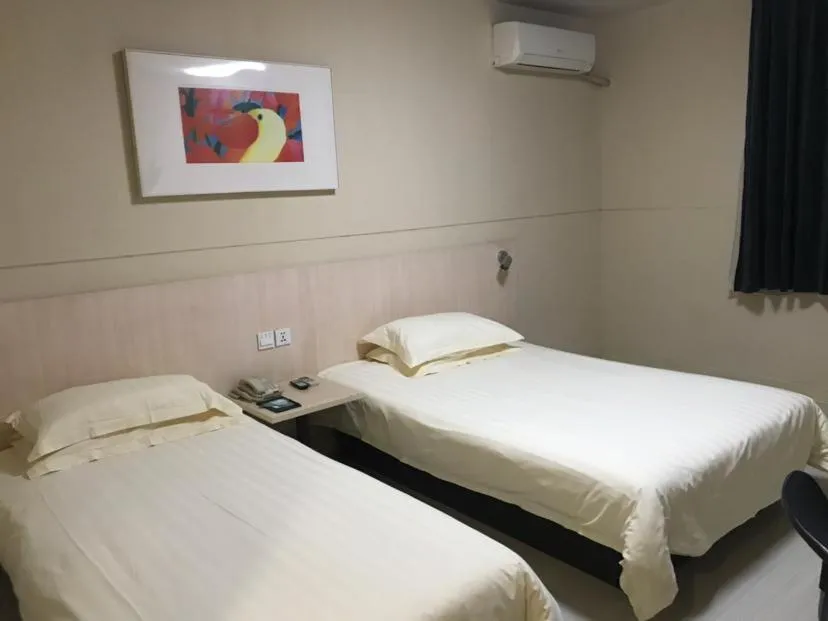 Bed in Jinjiang Inn Xuzhou Xinyi Municipal Government