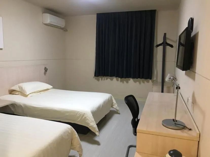 Bed in Jinjiang Inn Xuzhou Xinyi Municipal Government