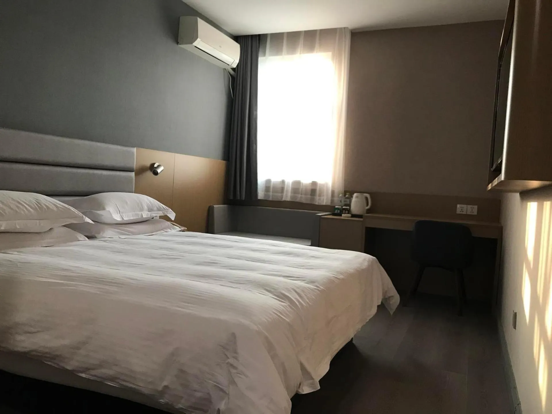 Bed in Jinjiang Inn Xuzhou Xinyi Municipal Government