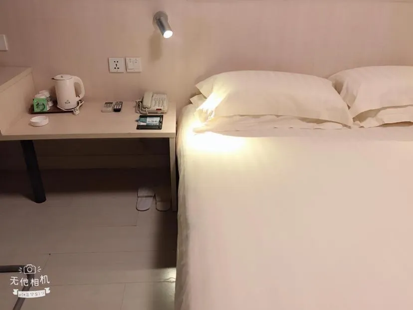 Bed in Jinjiang Inn Xuzhou Xinyi Municipal Government