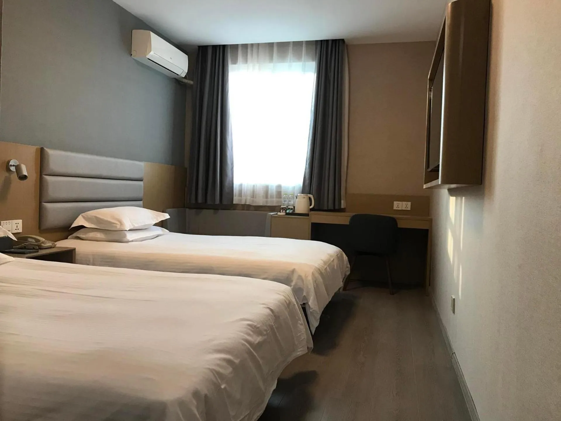 Bed in Jinjiang Inn Xuzhou Xinyi Municipal Government