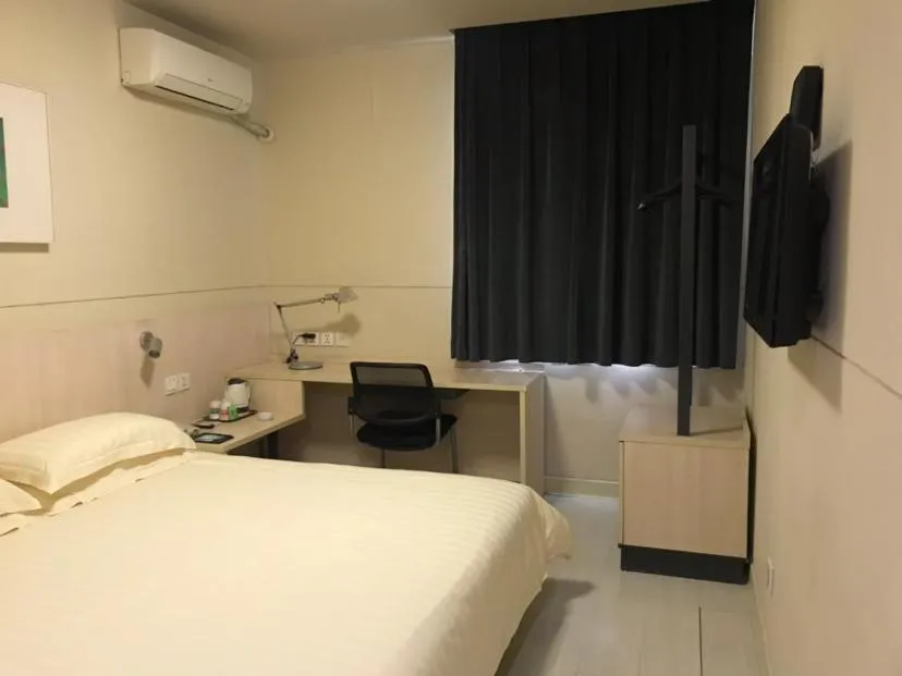 Bed in Jinjiang Inn Xuzhou Xinyi Municipal Government