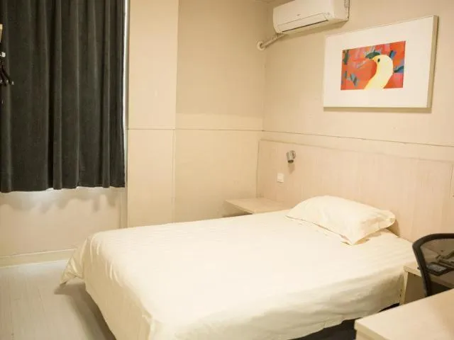 Bed in Jinjiang Inn Xuzhou Xinyi Municipal Government