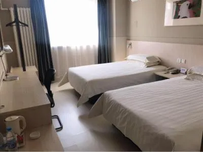 Bed in Jinjiang Inn Yingkou Port Authority Bayuquan Century Plaza