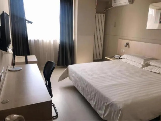 Bed in Jinjiang Inn Yingkou Port Authority Bayuquan Century Plaza