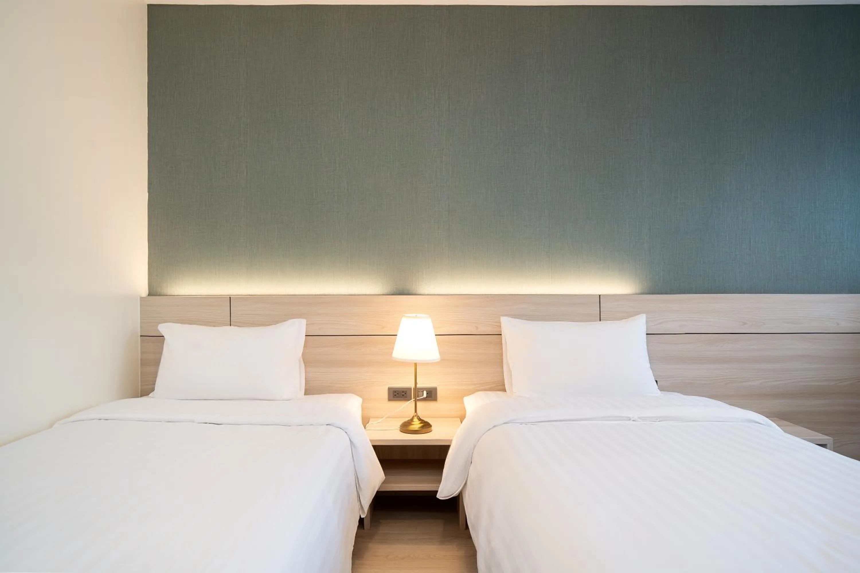 Bed in Amanah Bangkok Hotel