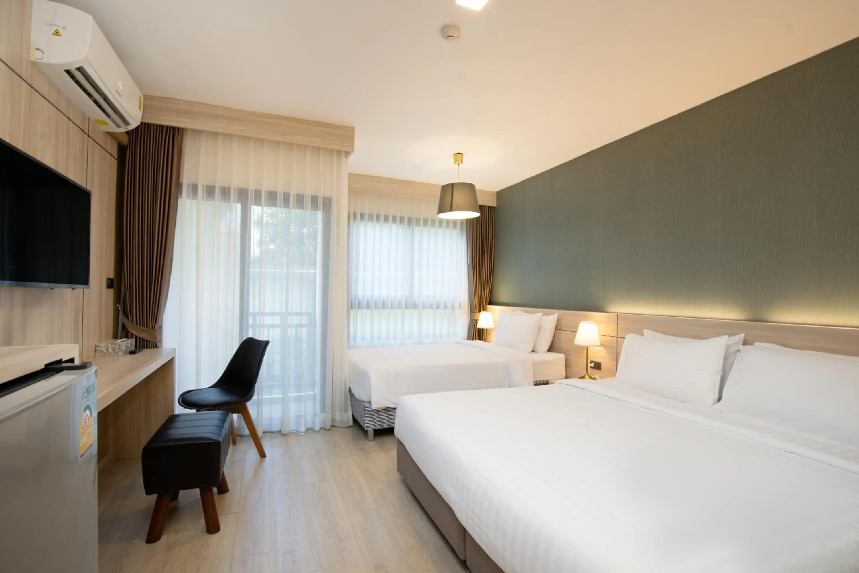 Bed in Amanah Bangkok Hotel