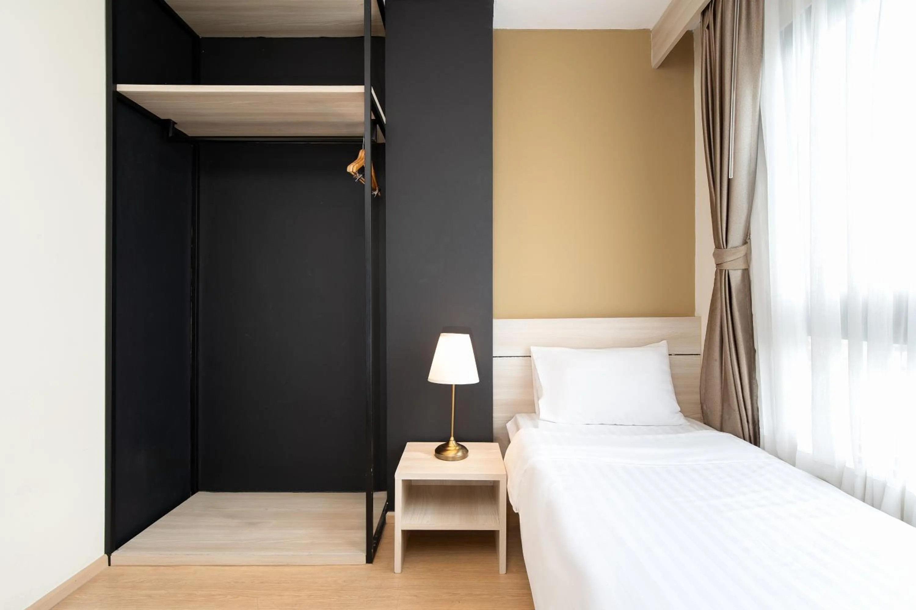 Bed in Amanah Bangkok Hotel