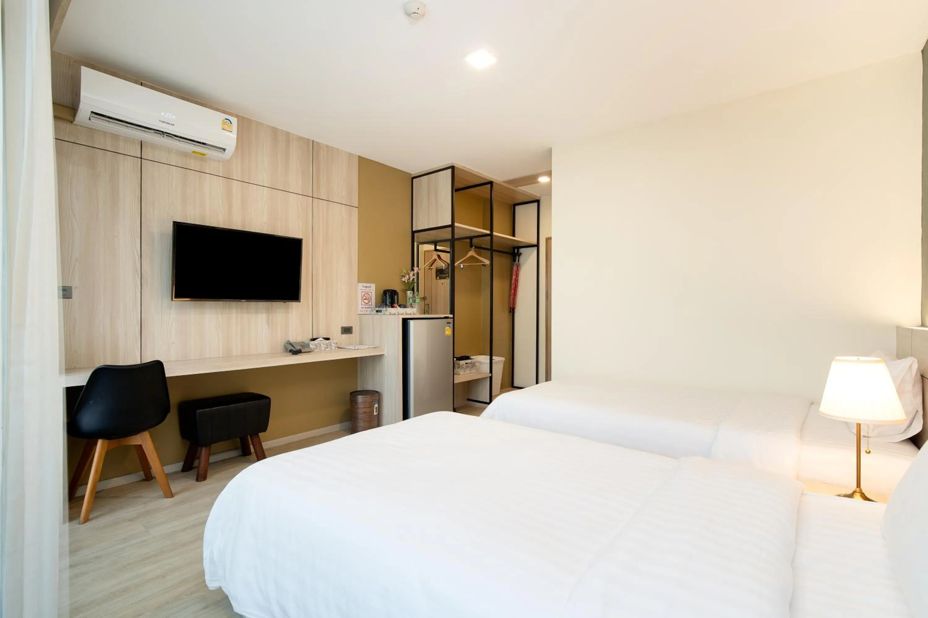 Seating area, Bed in Amanah Bangkok Hotel