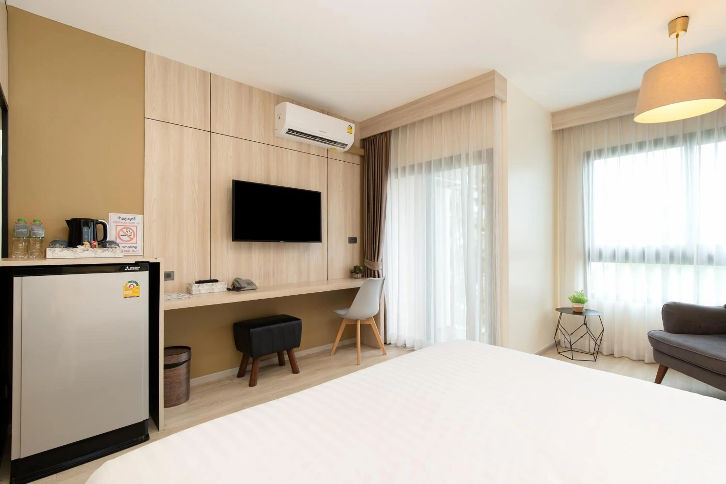 Seating area, Bed in Amanah Bangkok Hotel