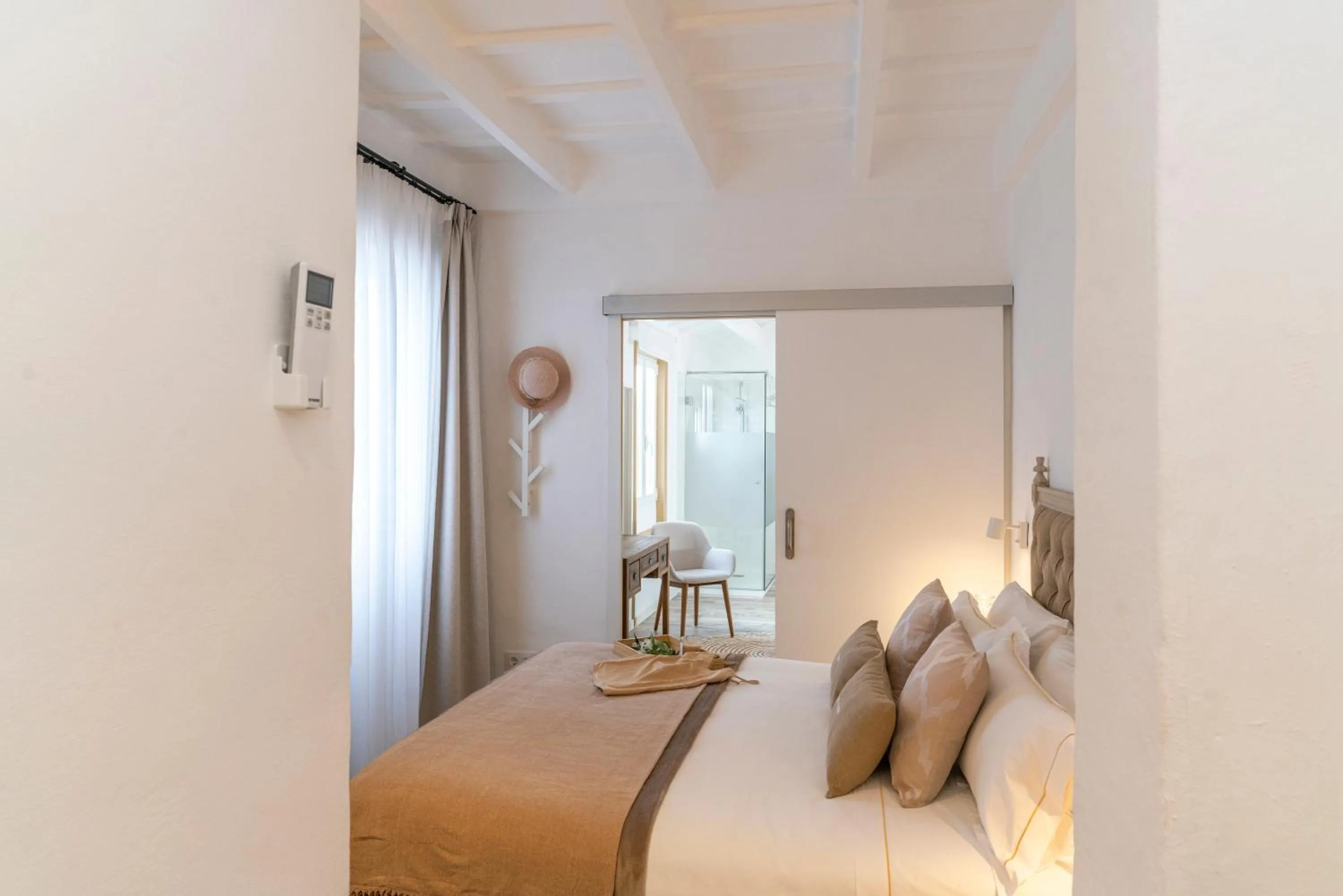 Bed in Encant de Alaior Boutique Hotel