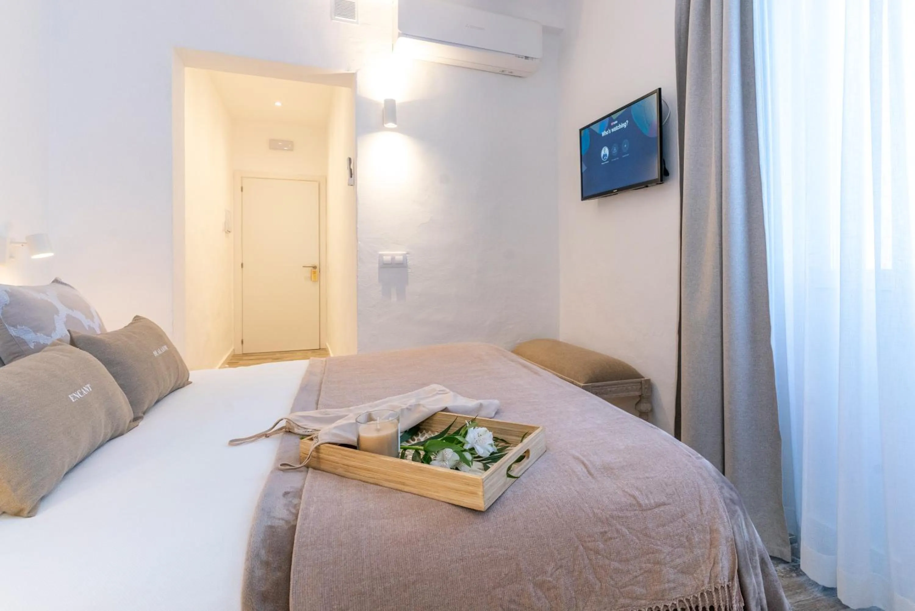 Bed in Encant de Alaior Boutique Hotel