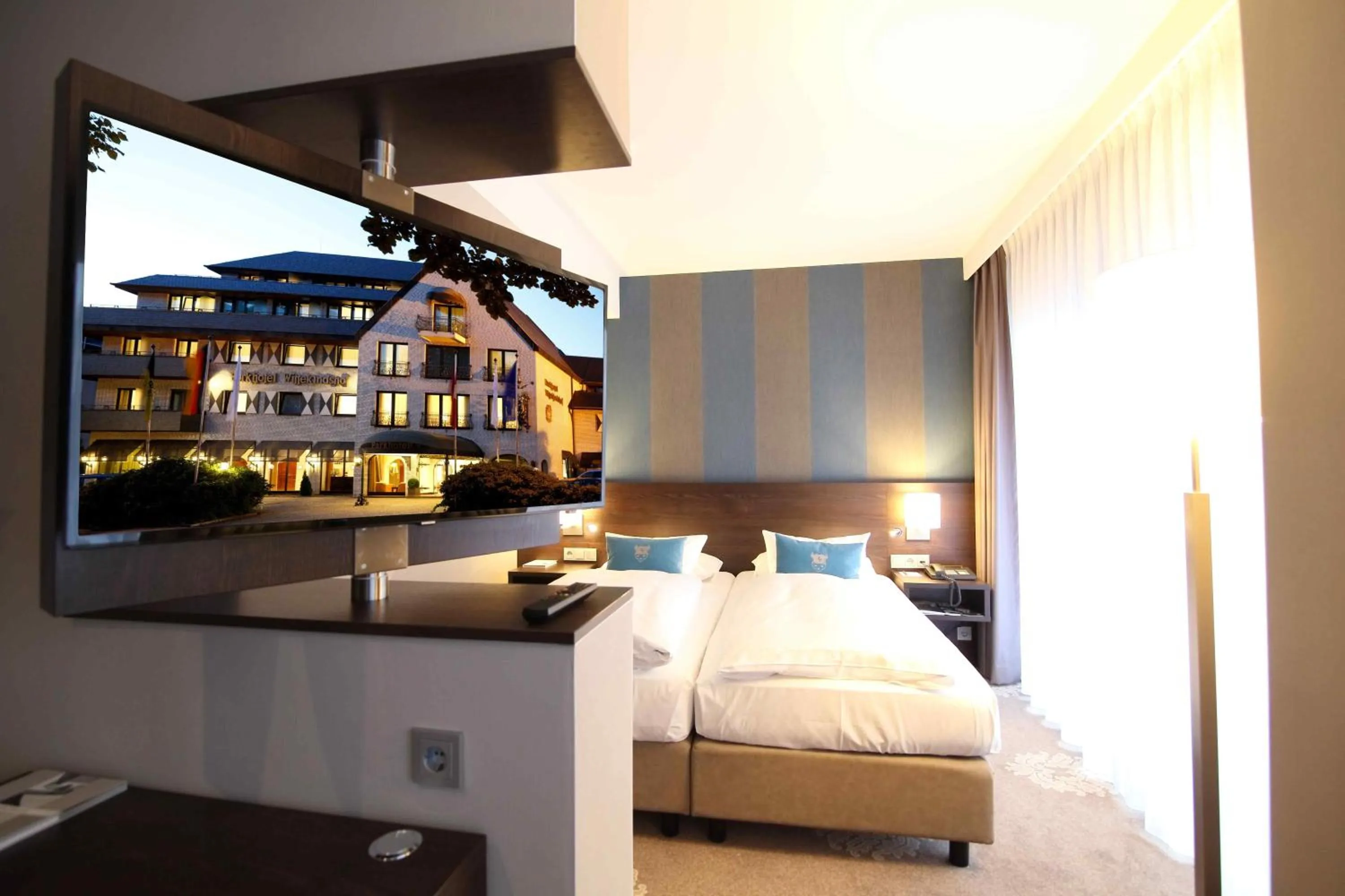 Photo of the whole room, Bed in Parkhotel Wittekindshof