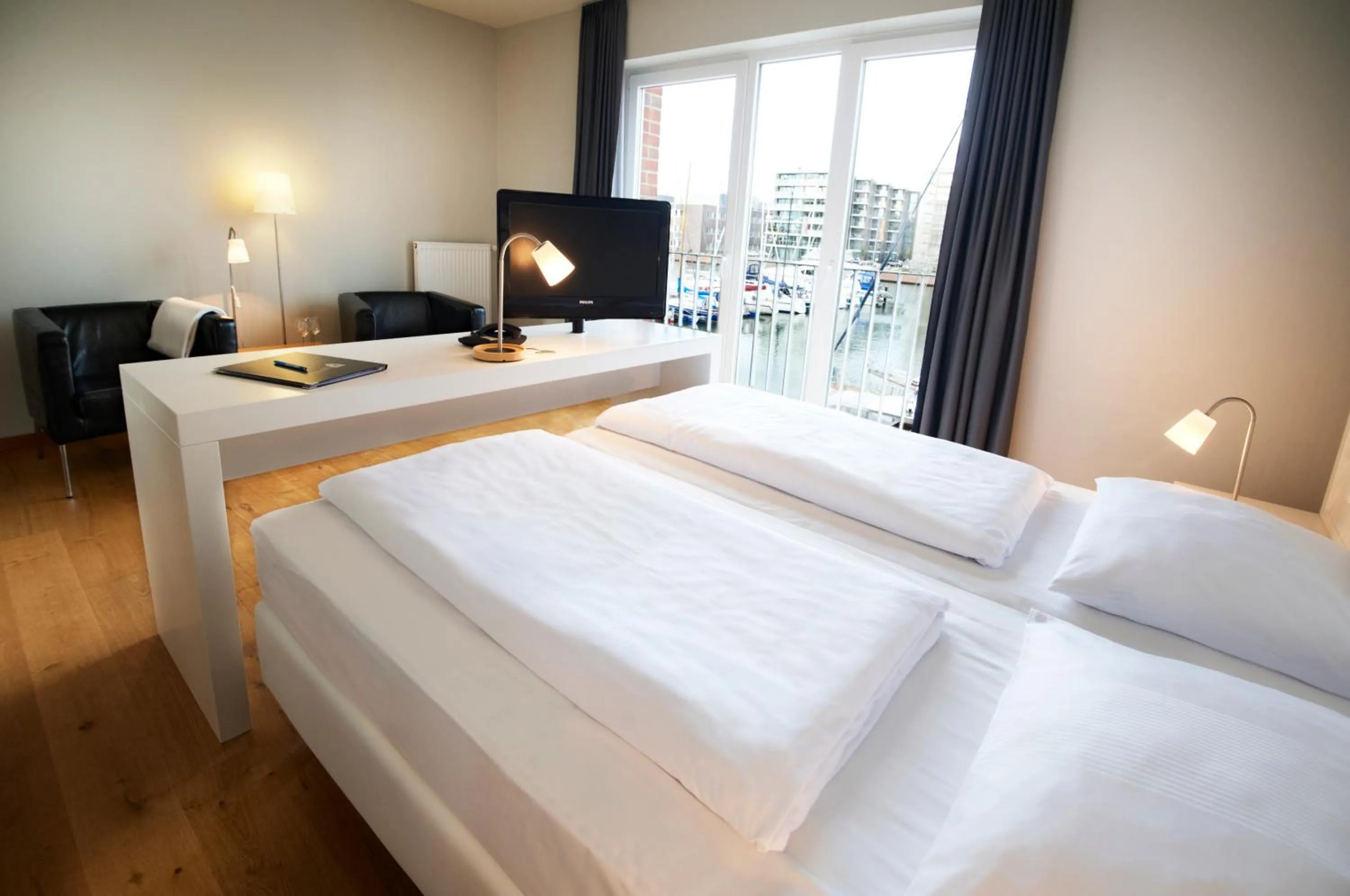 Photo of the whole room, Bed in Im-Jaich Boardinghouse Bremerhaven