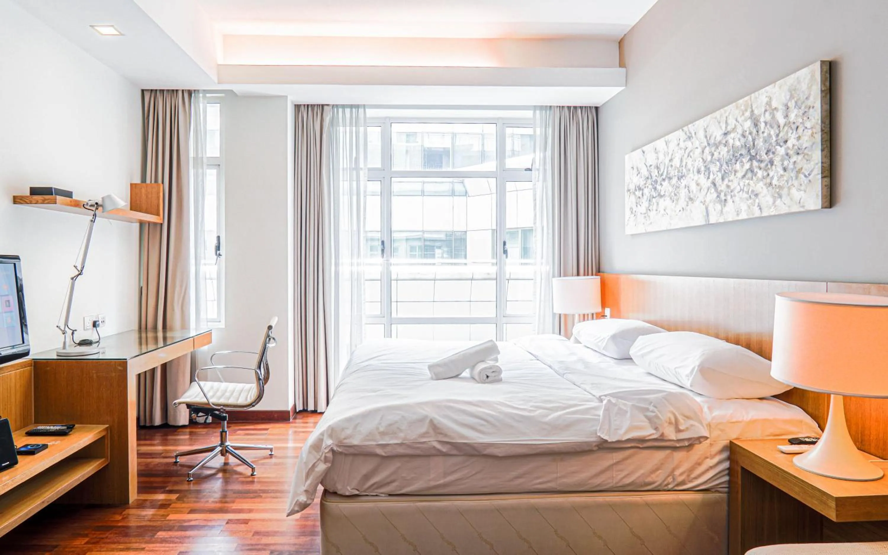 Bed in Lot 163 at Cormar Suites by Airhost