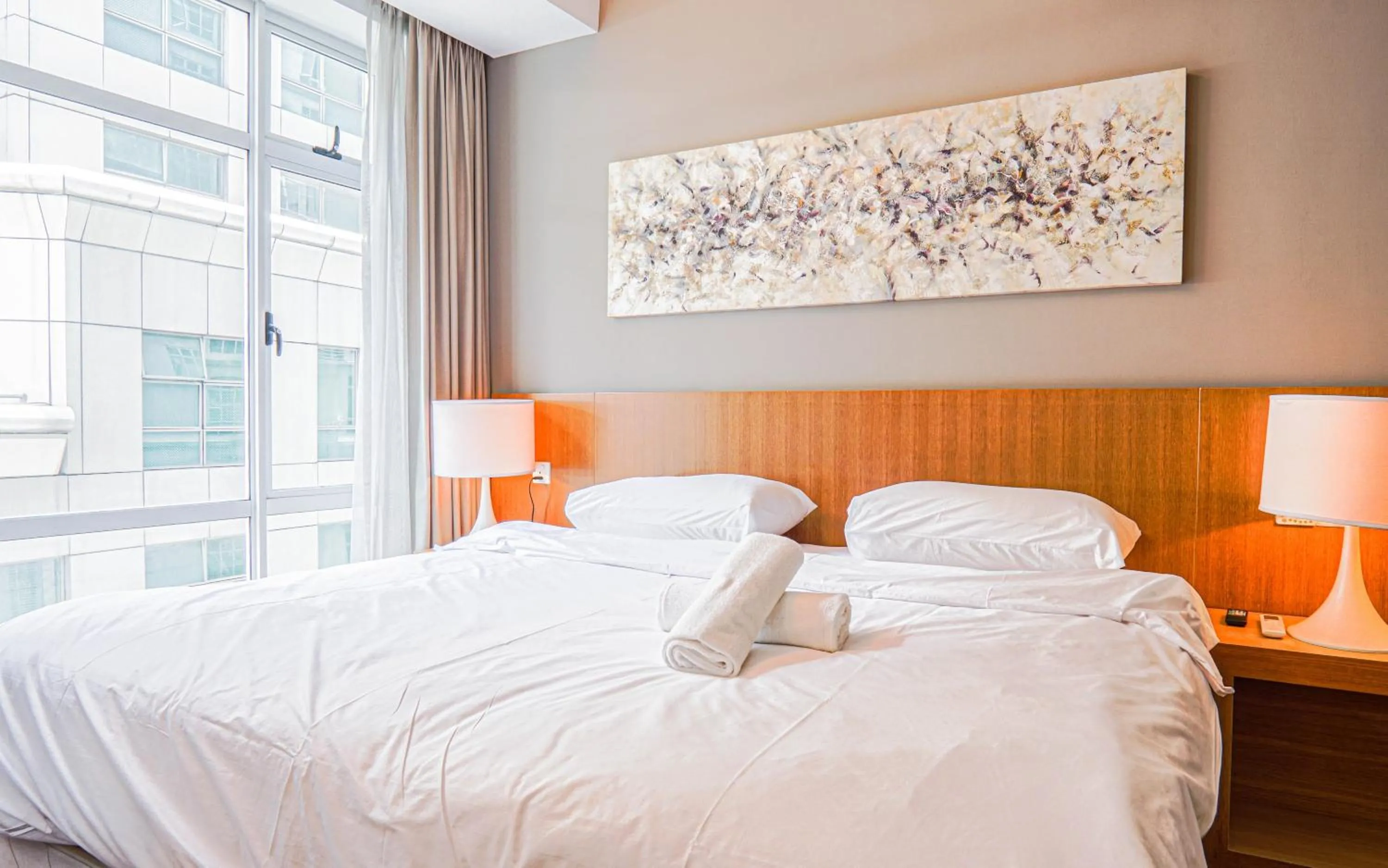 Bed in Lot 163 at Cormar Suites by Airhost