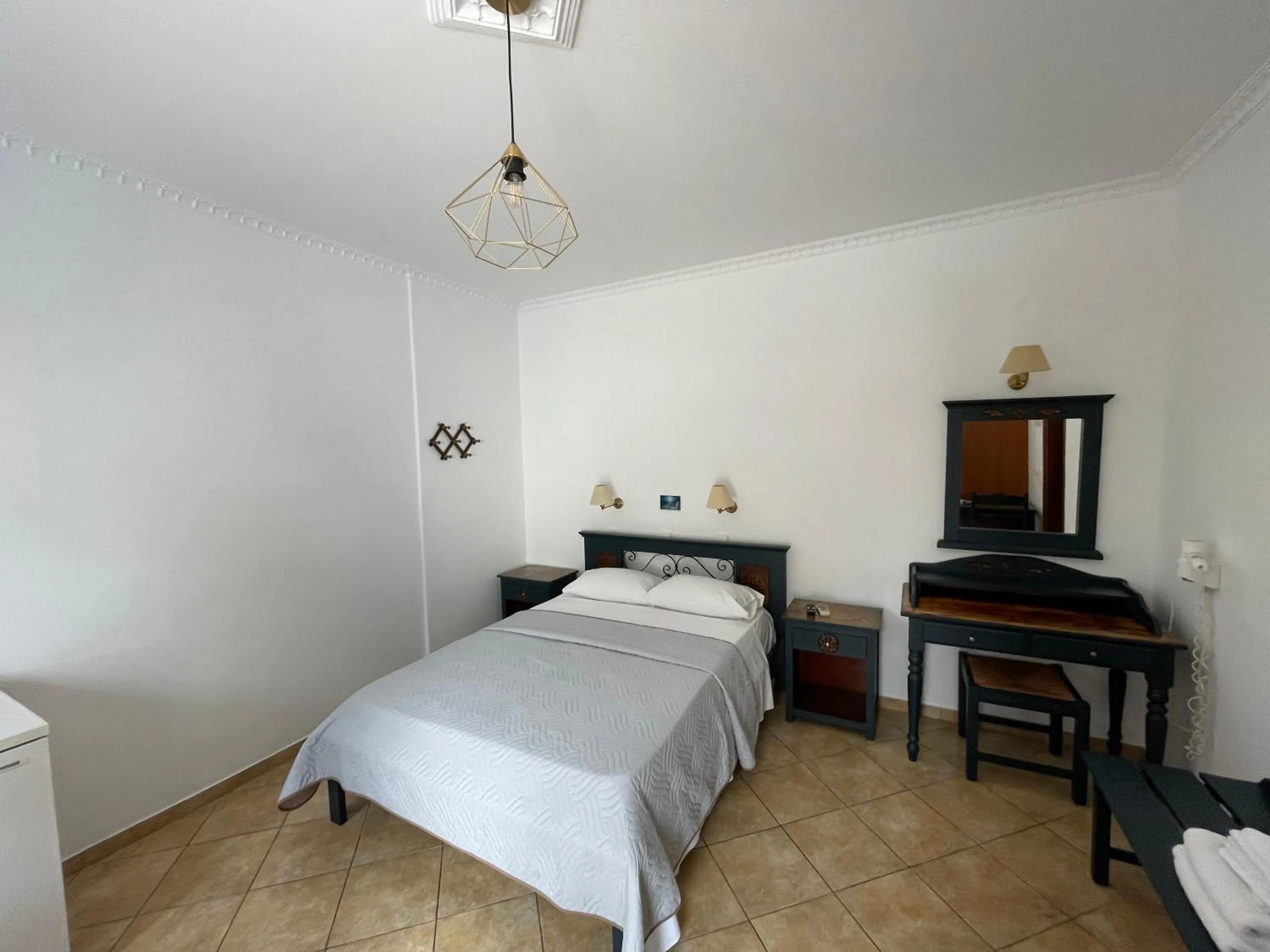 Bed in Leonidas Apartments