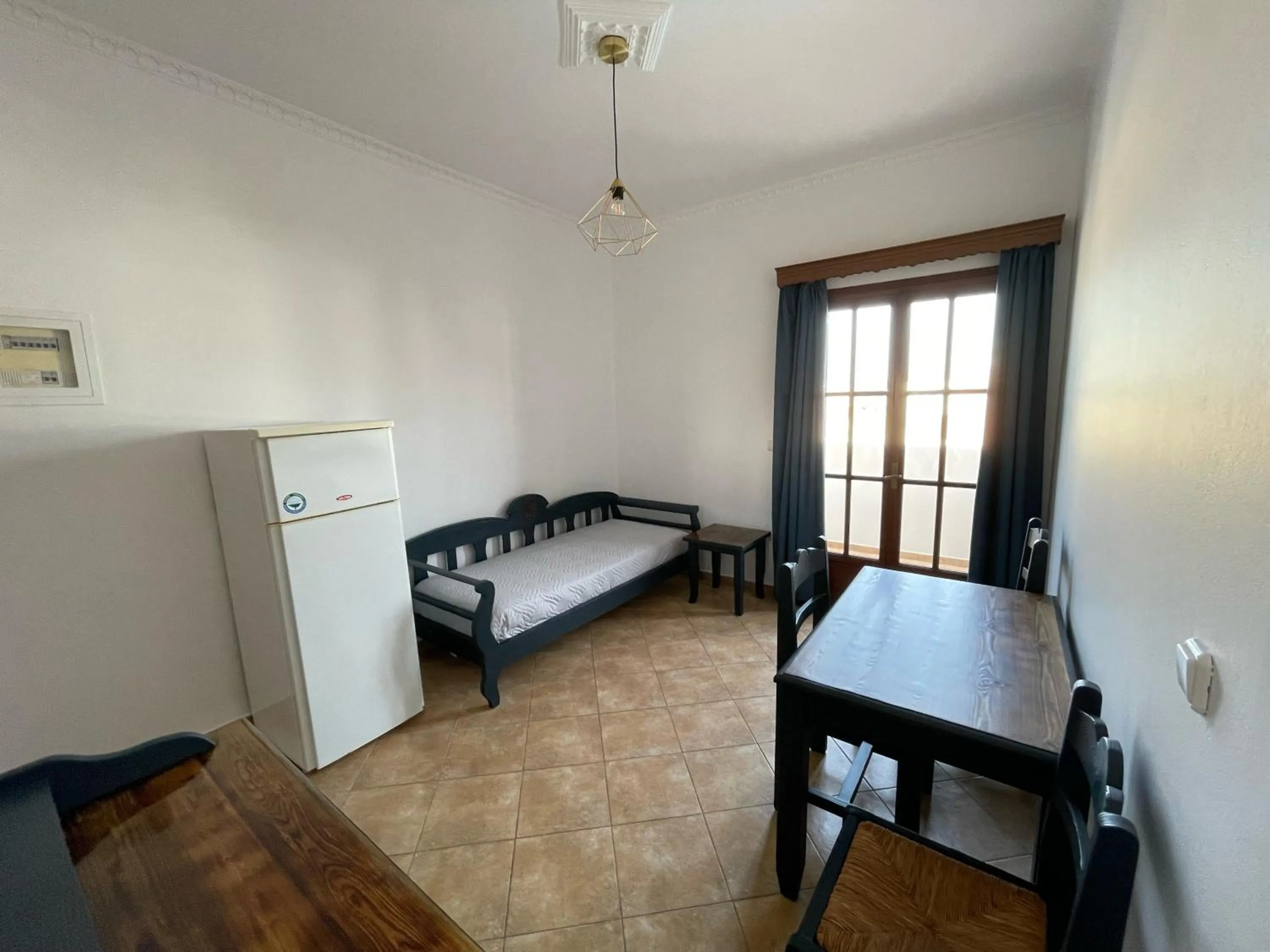 Bed in Leonidas Apartments