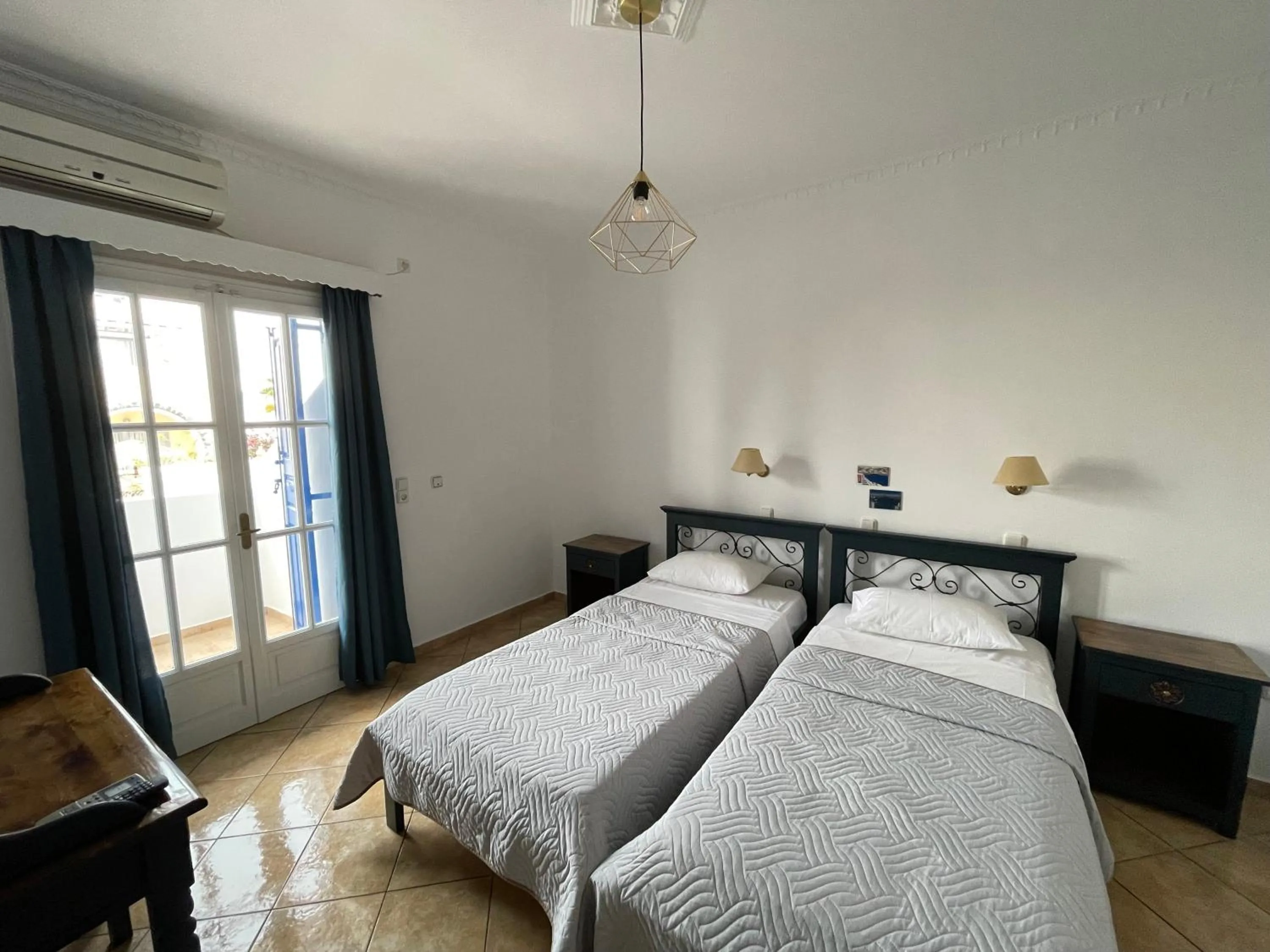 Bed in Leonidas Apartments