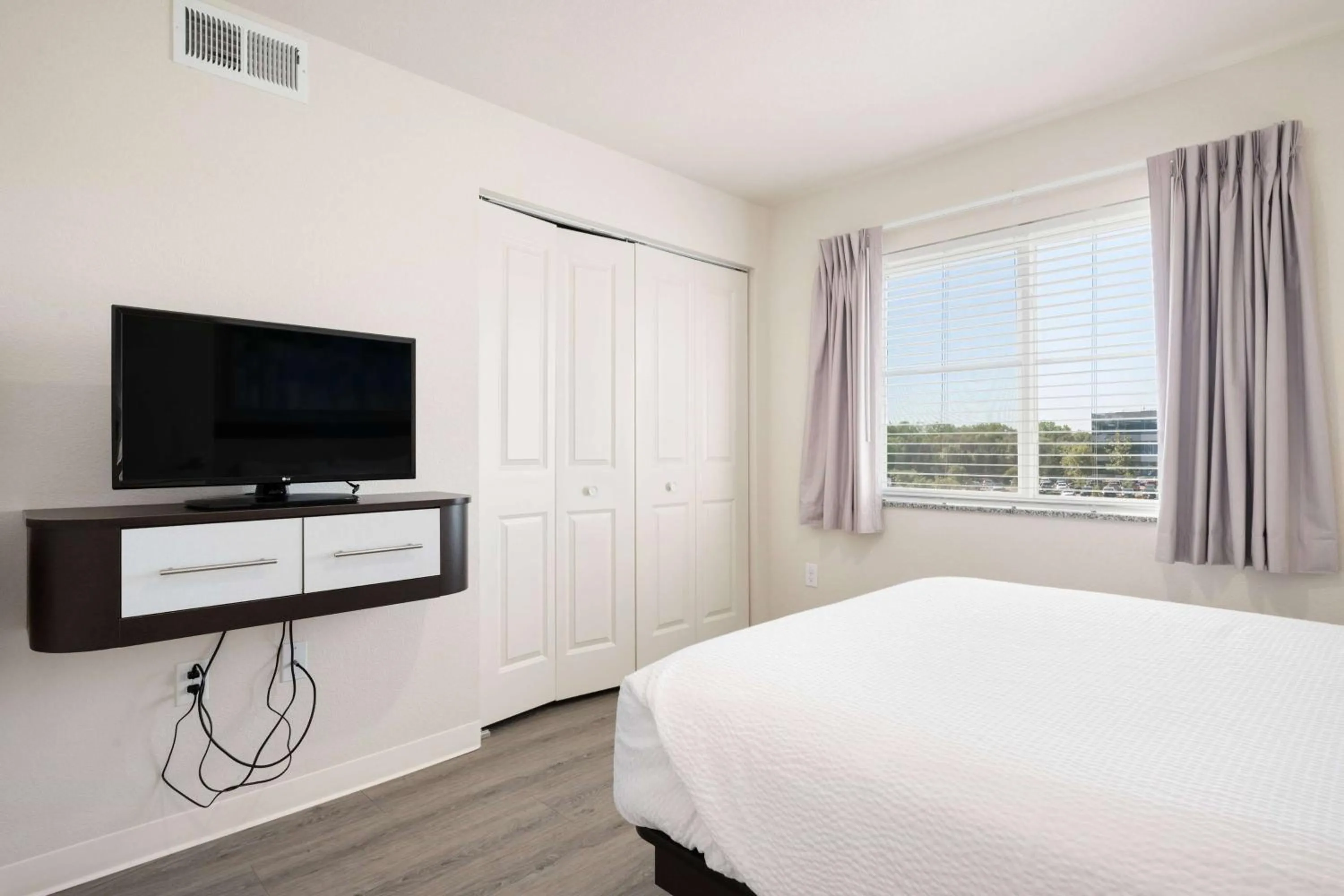 Photo of the whole room, Bed in WaterWalk Extended Stay by Wyndham Minneapolis - Plymouth
