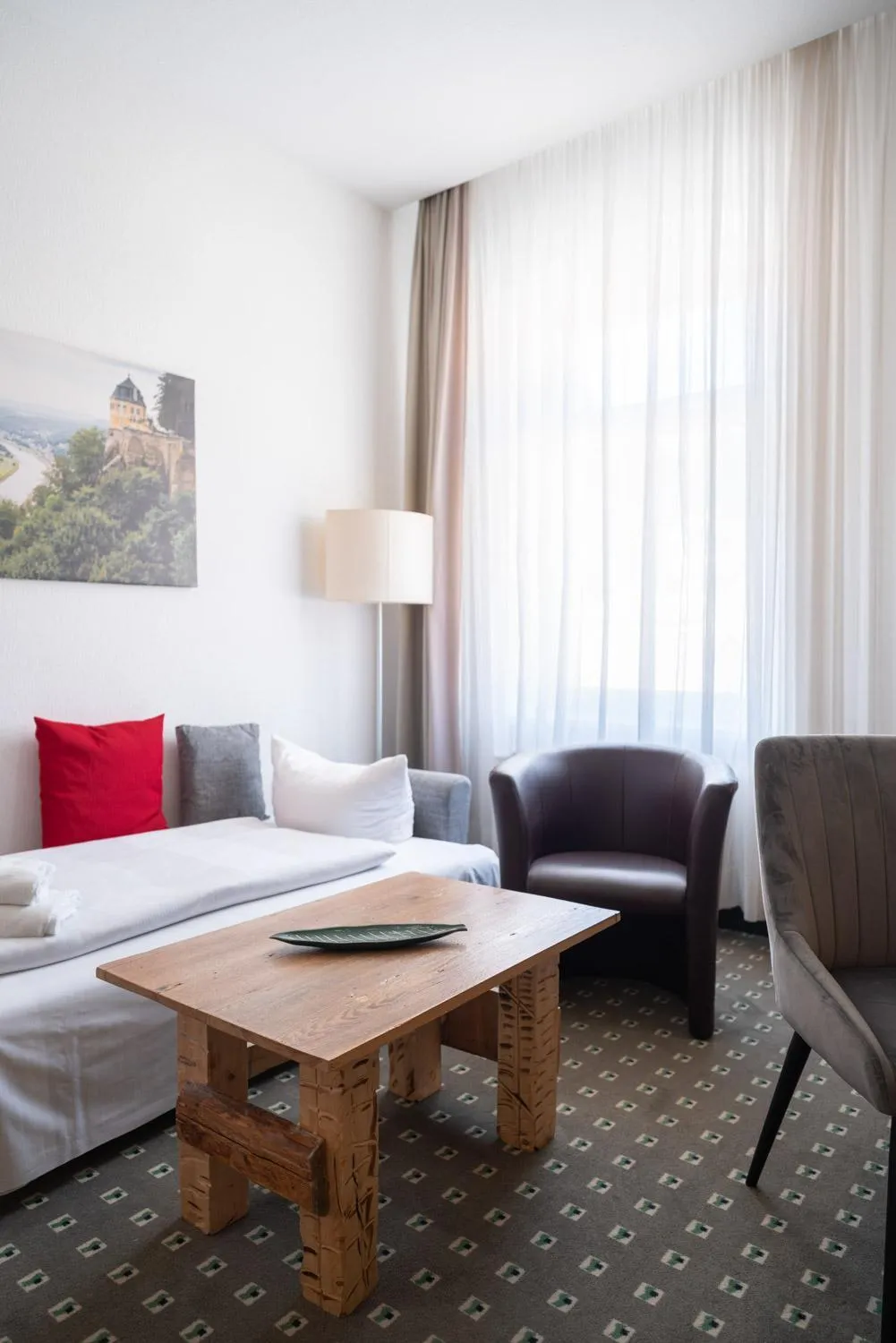 Living room, Bed in Manufaktur Boutique Hotel