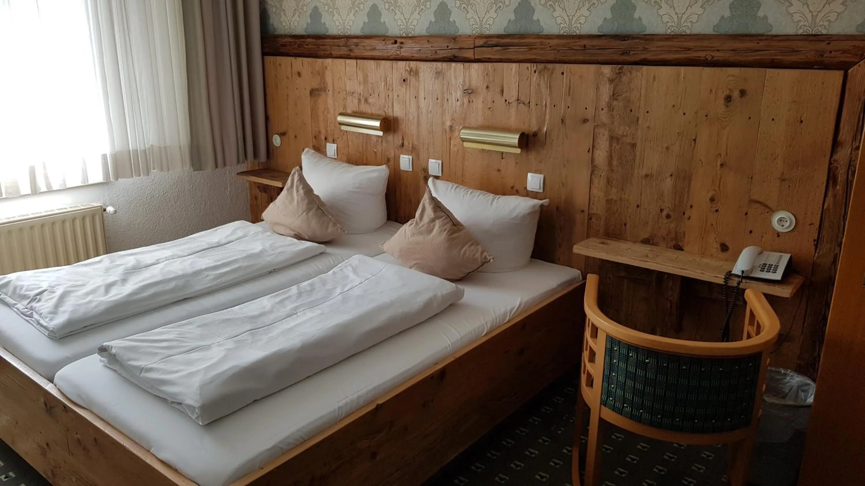 Bed in Manufaktur Boutique Hotel