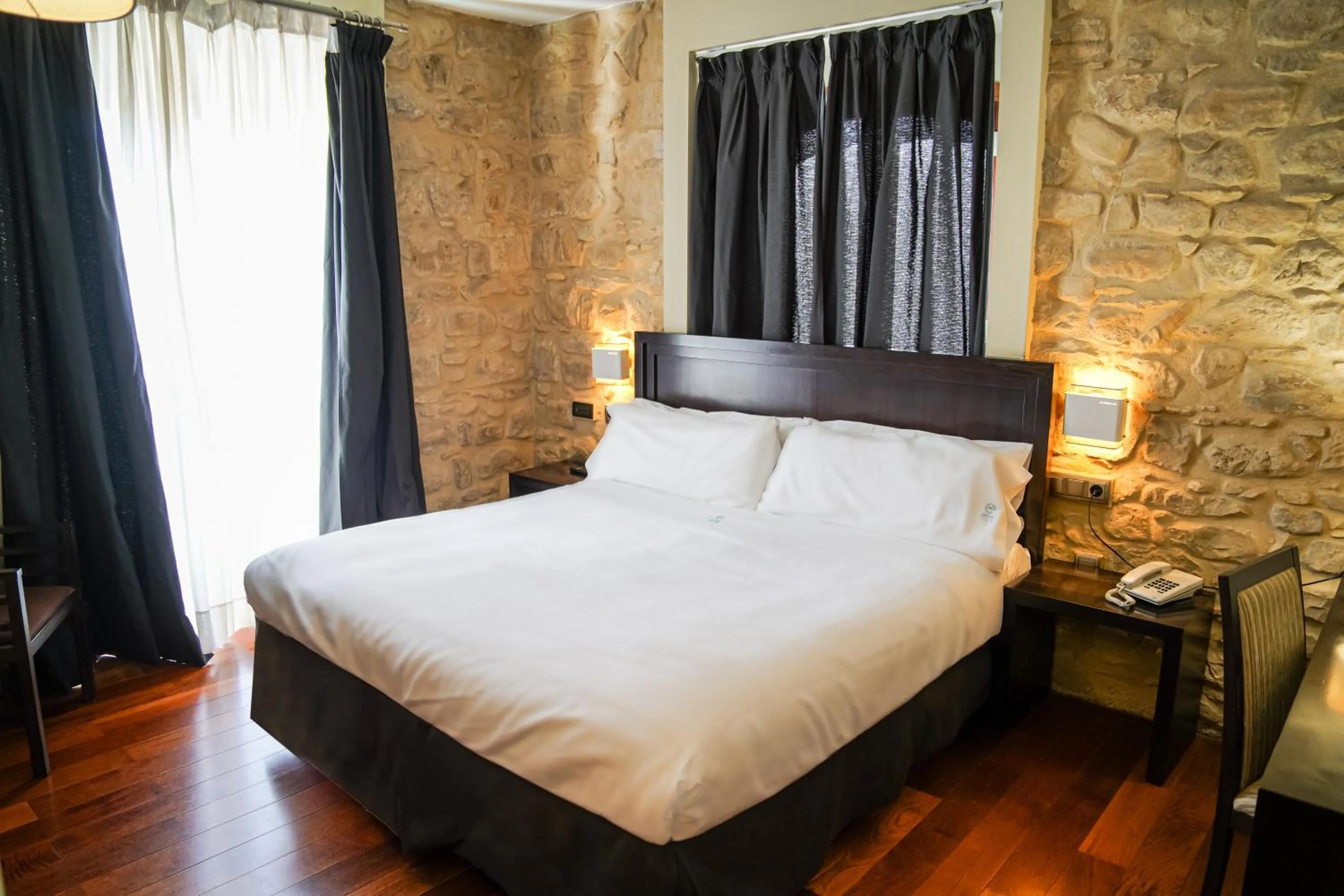 Bed in Hotel Baeza Monumental by eme hoteles