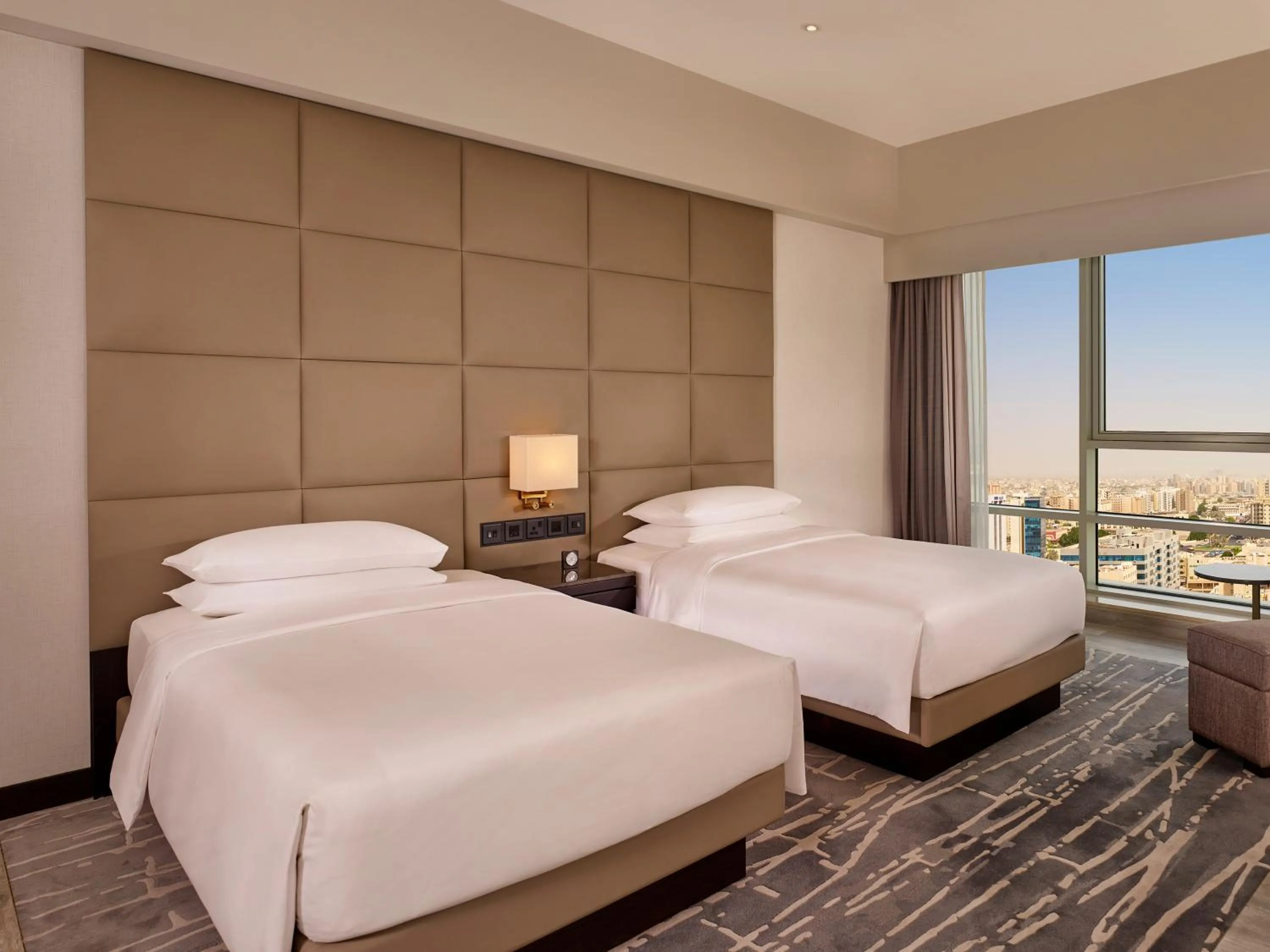 Photo of the whole room, Bed in Hyatt Regency Al Kout Mall