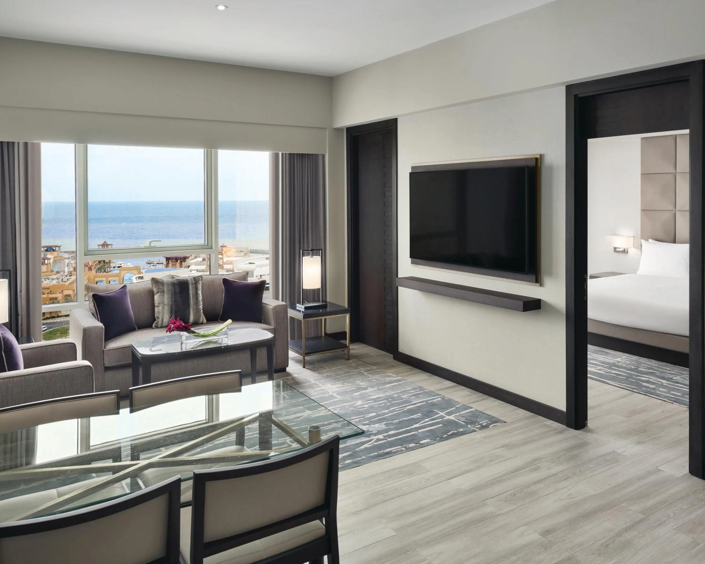 Communal lounge/ TV room, Bed in Hyatt Regency Al Kout Mall