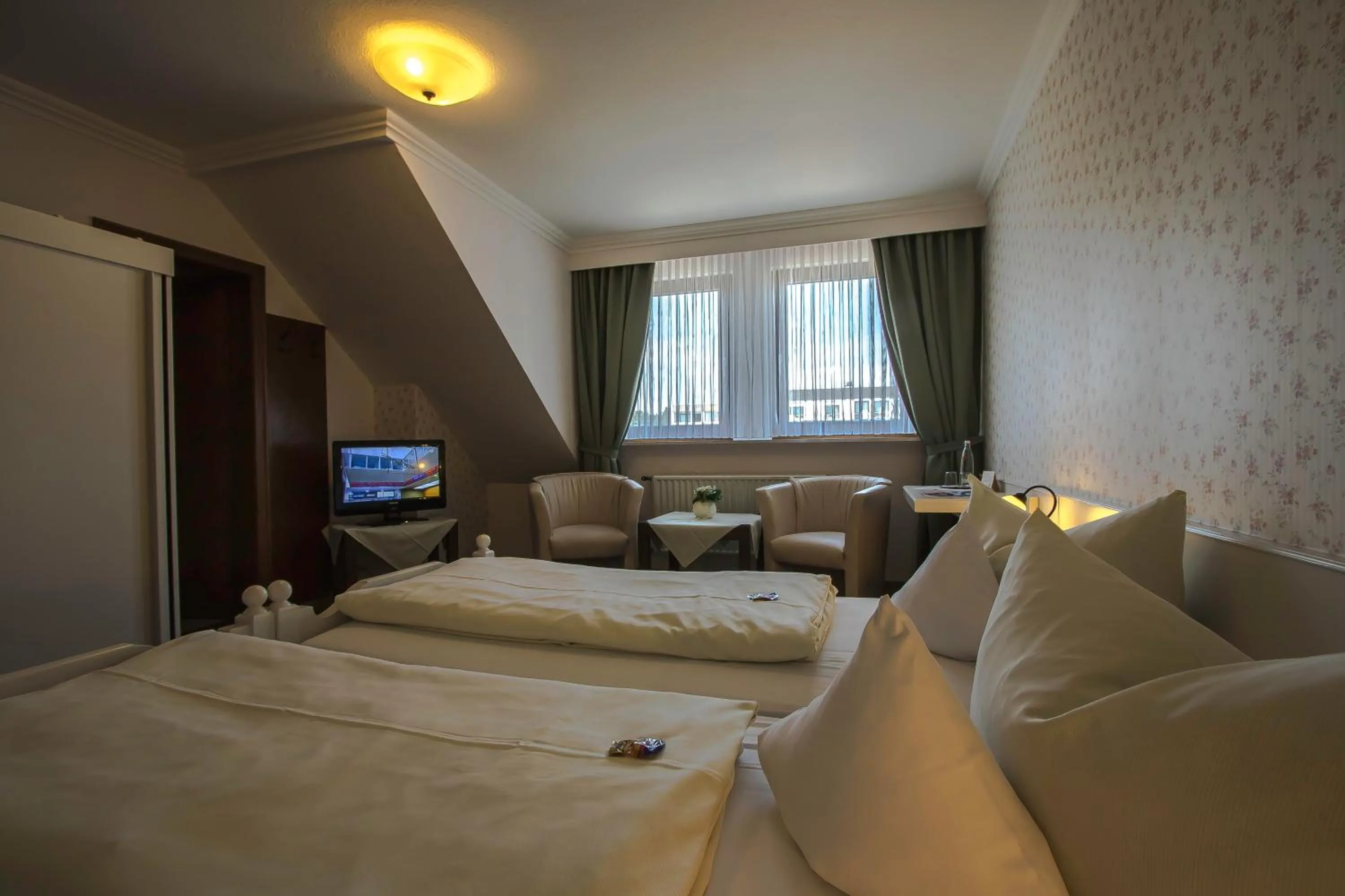 Bed in Hotel Schneider