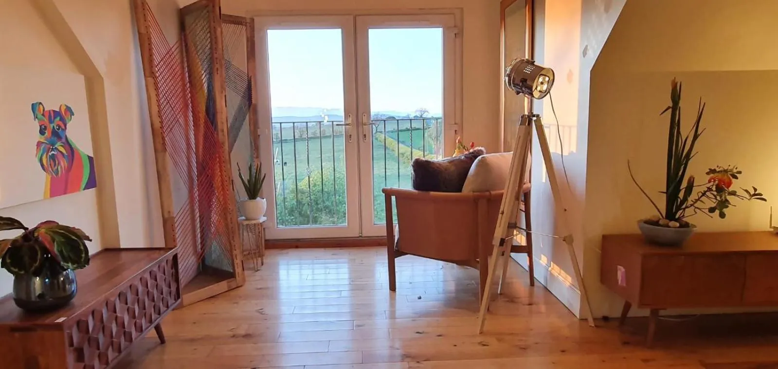 Seating area in The Orange Fox Lux Room and Hot Tub at The Grumpy Schnauzer Guest House